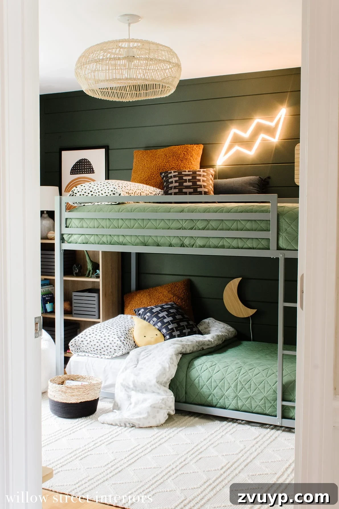 Smart Bunk Beds to Maximize Small Bedrooms 6 Gender-neutral modern bunk beds featuring convenient plug-in wall lights for individual reading and ambiance in a compact bedroom.