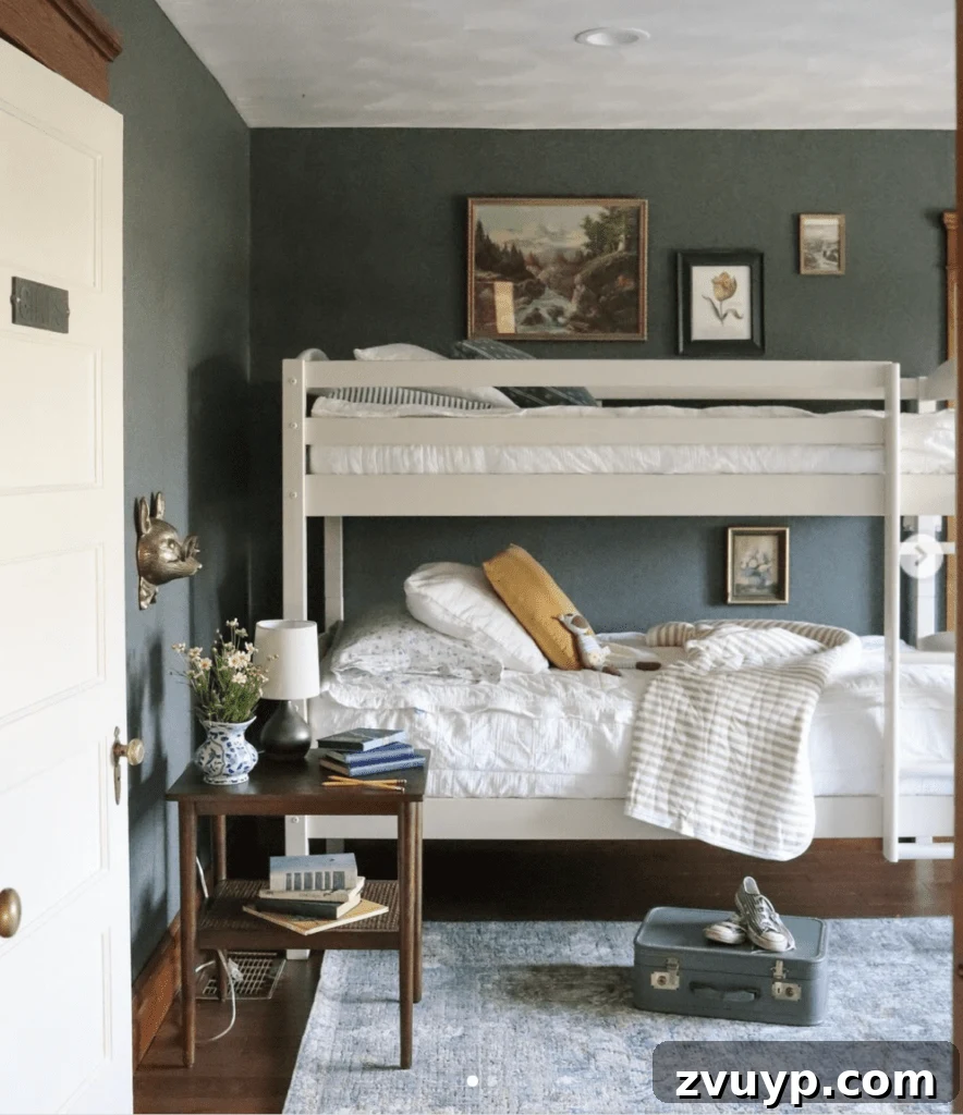 Smart Bunk Beds to Maximize Small Bedrooms 7 Gender-neutral cottage style bunk bed in a small room, beautifully adorned with antique accessories and vintage art for a unique character.