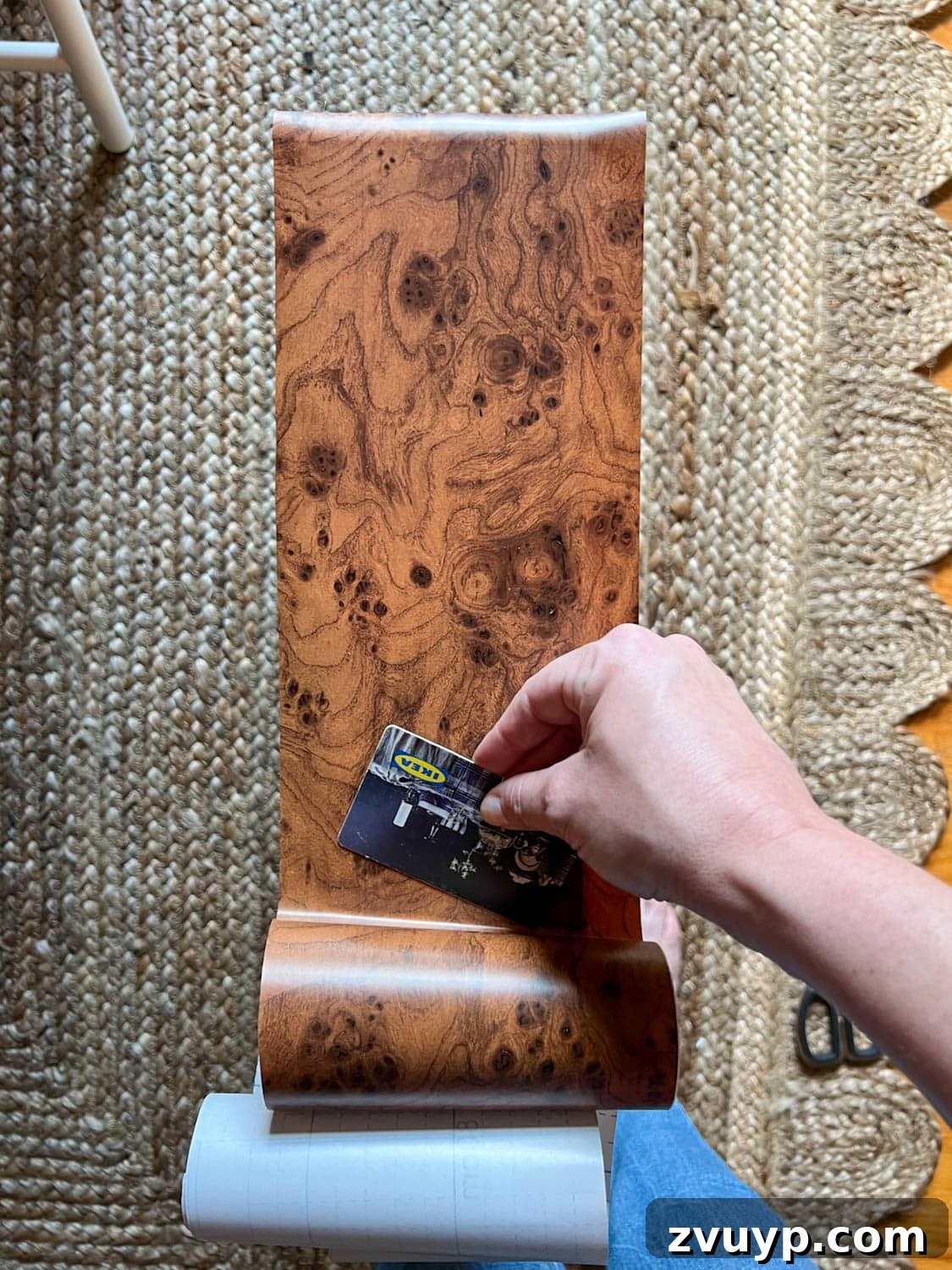 Instant Burl Wood Luxury IKEA Dresser Makeover 8 smoothing out burl wood contact paper to dresser drawer front