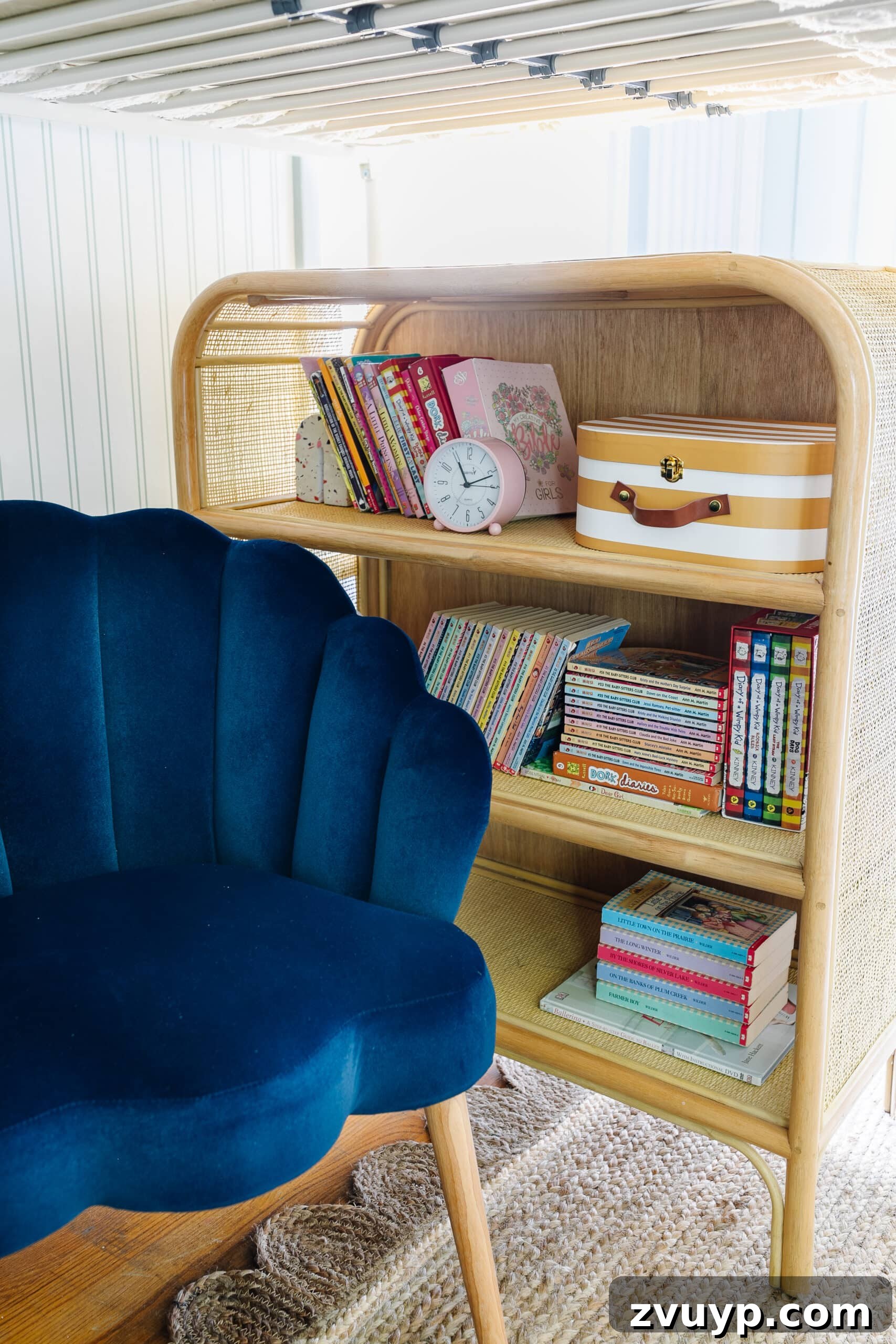 Ultimate Triple Bunk Beach Pad for Teens 11 kids reading nook with chair and rattan bookshelf