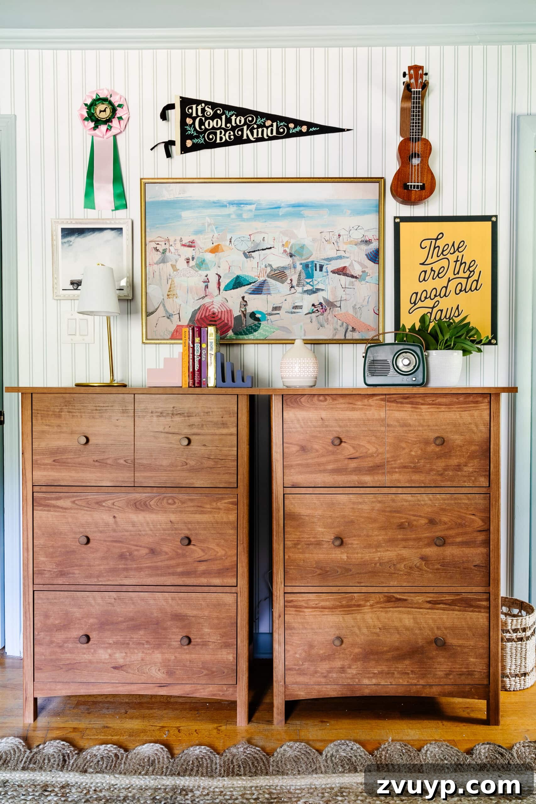 Ultimate Triple Bunk Beach Pad for Teens 16 vintage gallery wall in teenage bedroom above dressers with coastal paintings and camp art