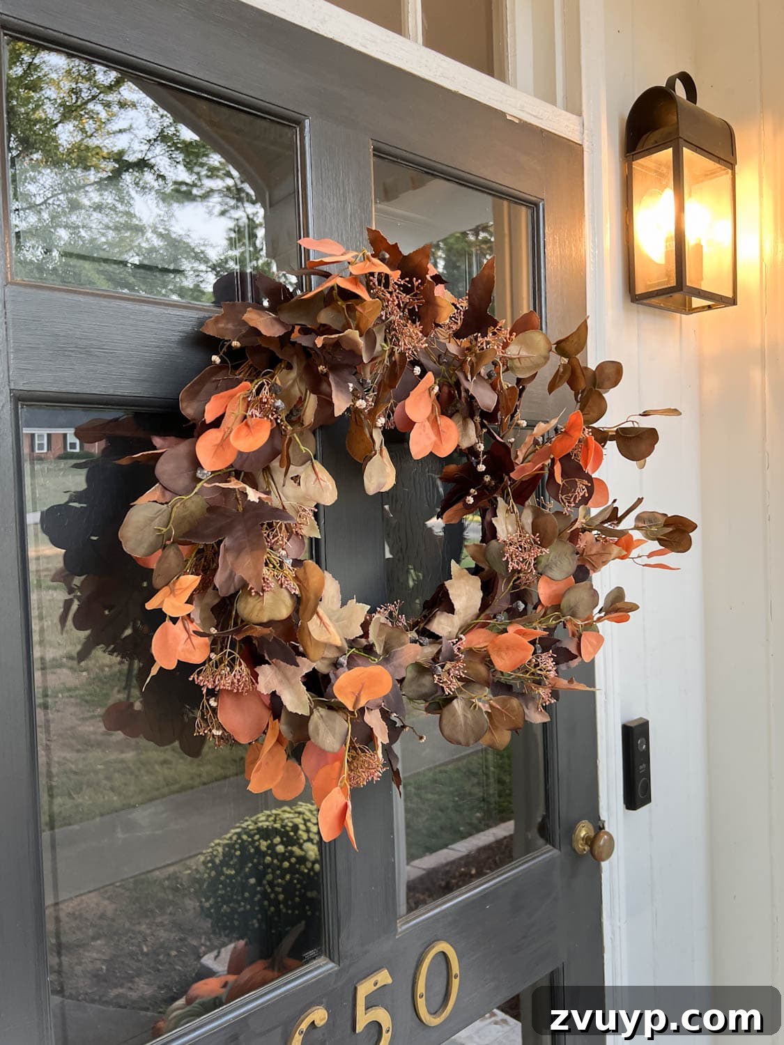Unbelievably Real: The Best Artificial Pumpkins of 2024 4 artificial fall wreath on a front door