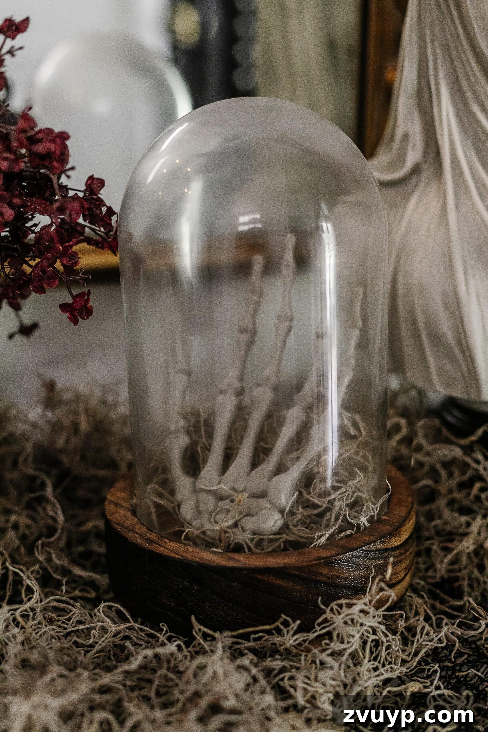 DIY Halloween decor skeleton hand in a cloche