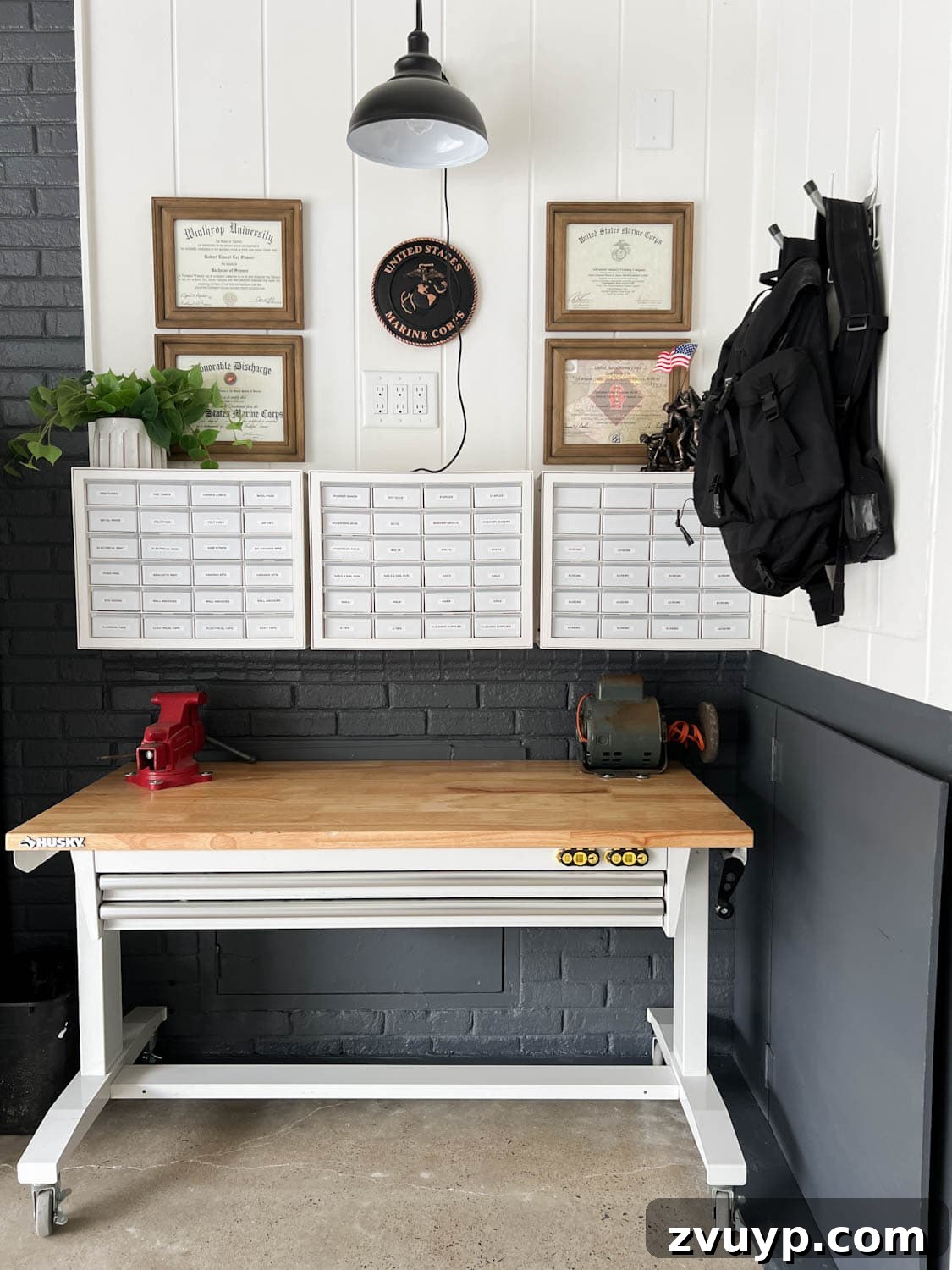Reclaim Your Garage Space with Smart Storage 26 rolling workbench under hardware organizers in a garage