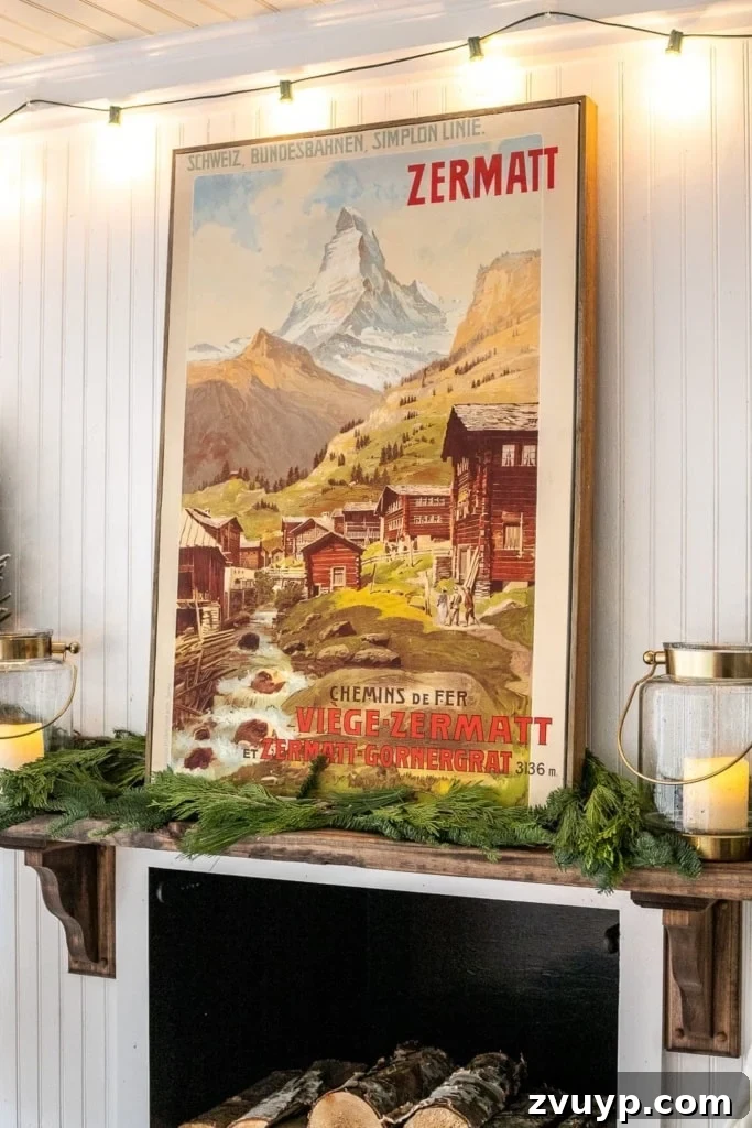 Deck Your Walls: 18 Festive Christmas Decor Ideas & Printable Holiday Art 9 Christmas art created by covering an old canvas with a new poster depicting a beautiful mountain scene