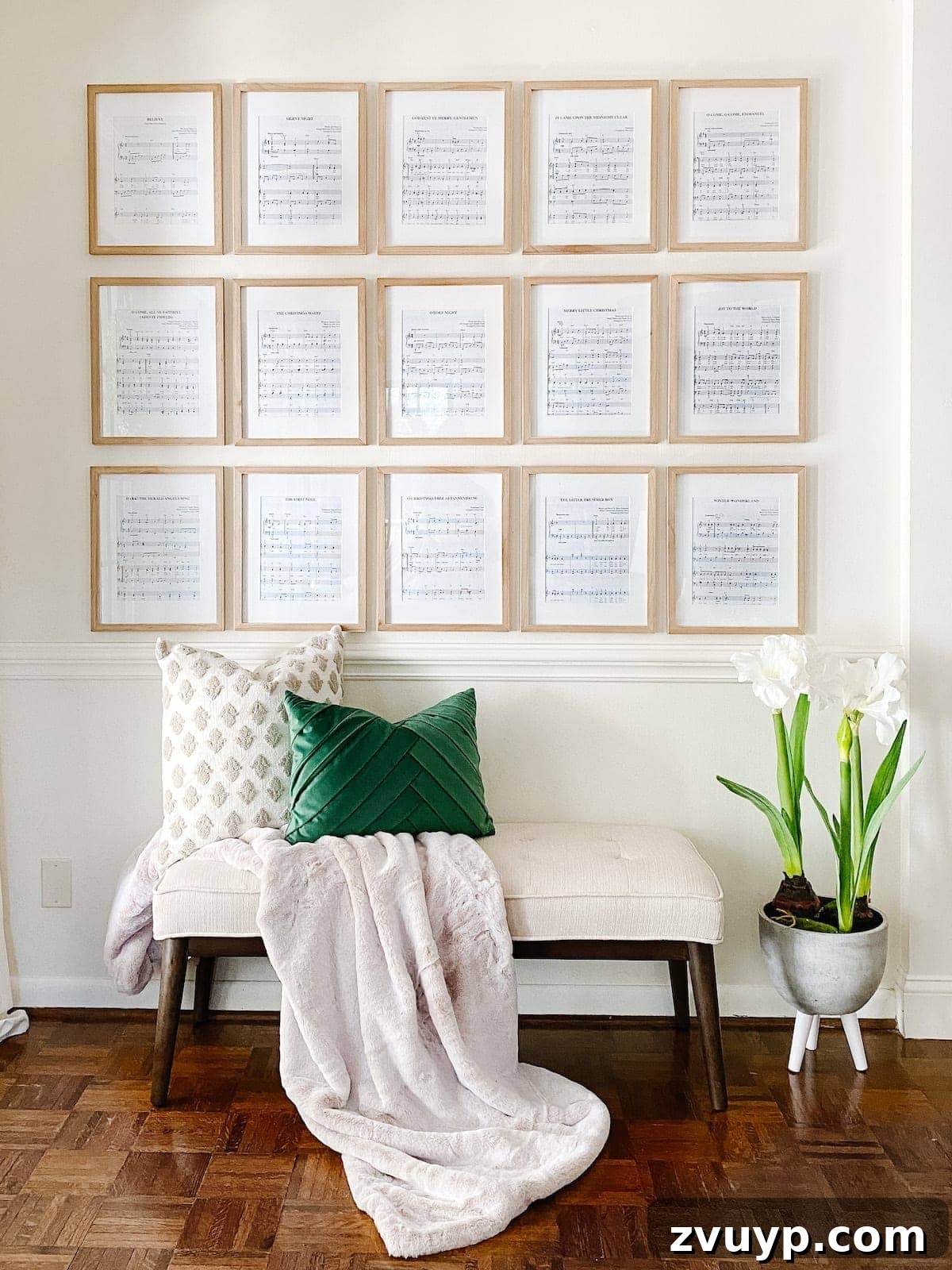 Deck Your Walls: 18 Festive Christmas Decor Ideas & Printable Holiday Art 3 DIY Christmas sheet music gallery wall using thrifted frames and holiday sheet music pages for an inexpensive festive display