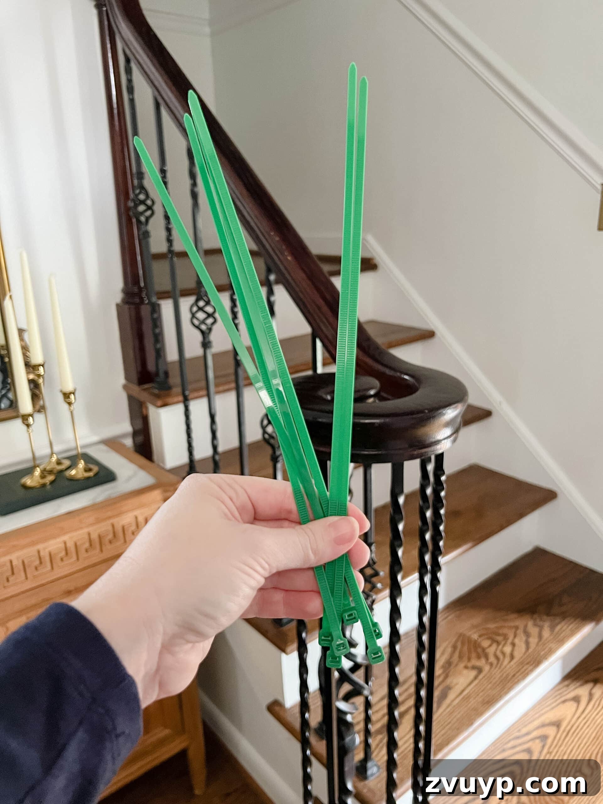 Deck the Halls Staircase and Entryway Christmas Garland Decor 4 zip ties used for hanging garland on banister