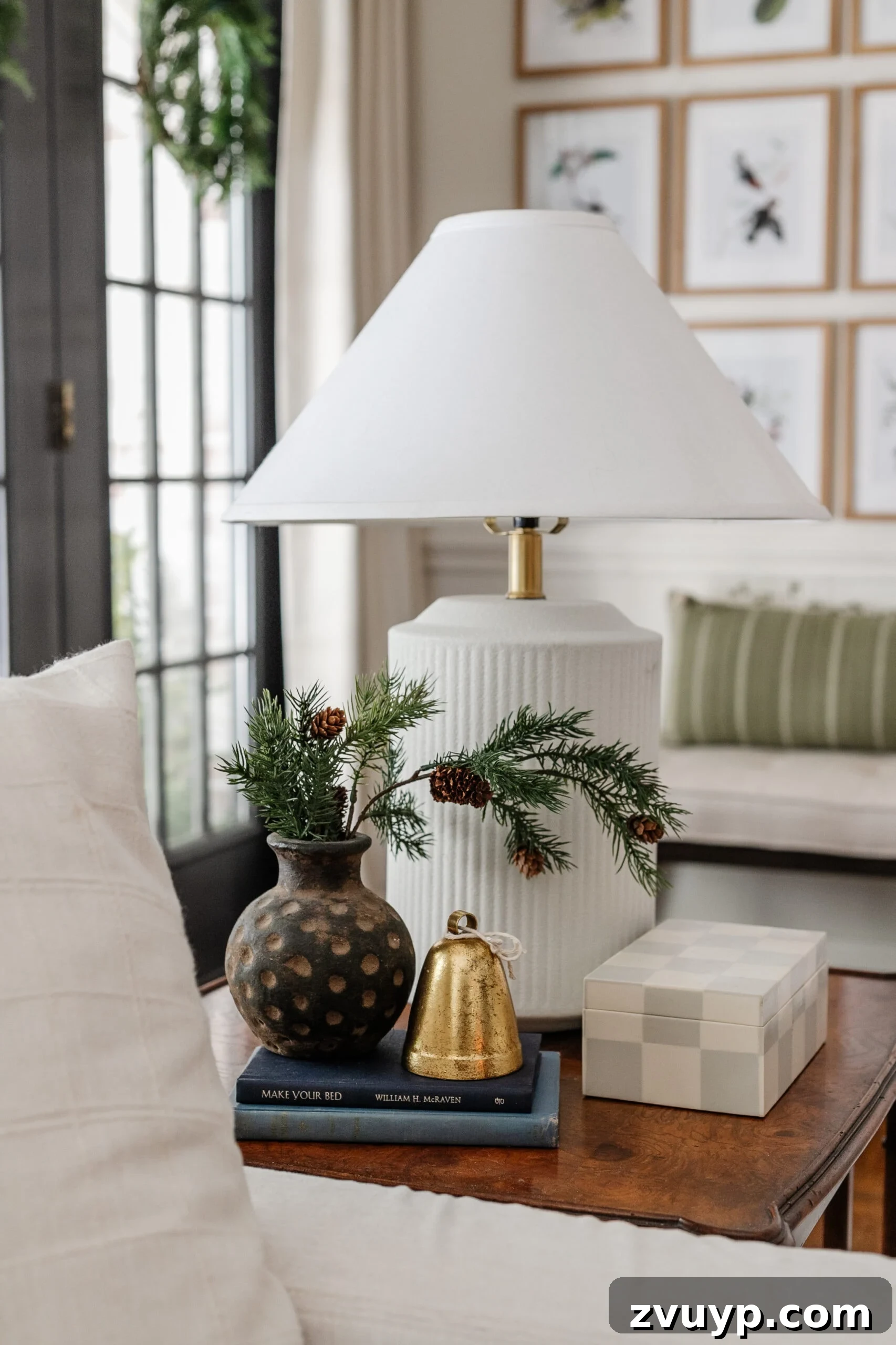 Festive Comfort: Living Room Decor for a Magical Christmas 11 Festive Christmas decor on an end table, featuring seasonal elements that add warmth and holiday spirit.
