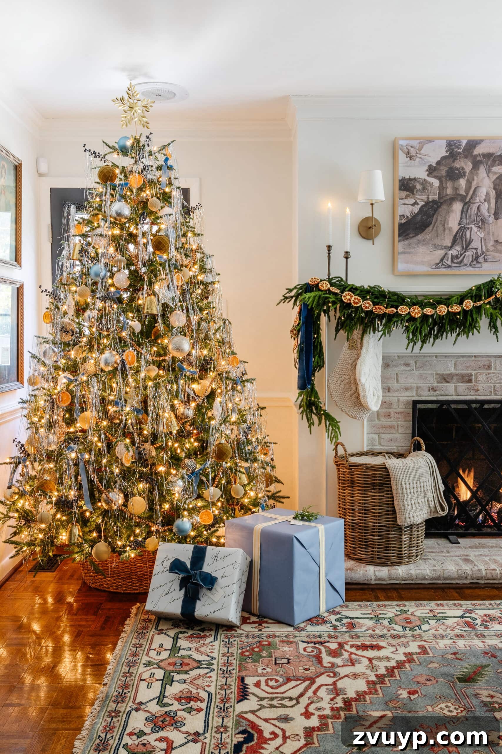 Festive Comfort: Living Room Decor for a Magical Christmas 12 A sparkling tinsel Christmas tree stands proudly beside a cozy fireplace, its base enhanced by an inverted tree collar for a rustic basket look.