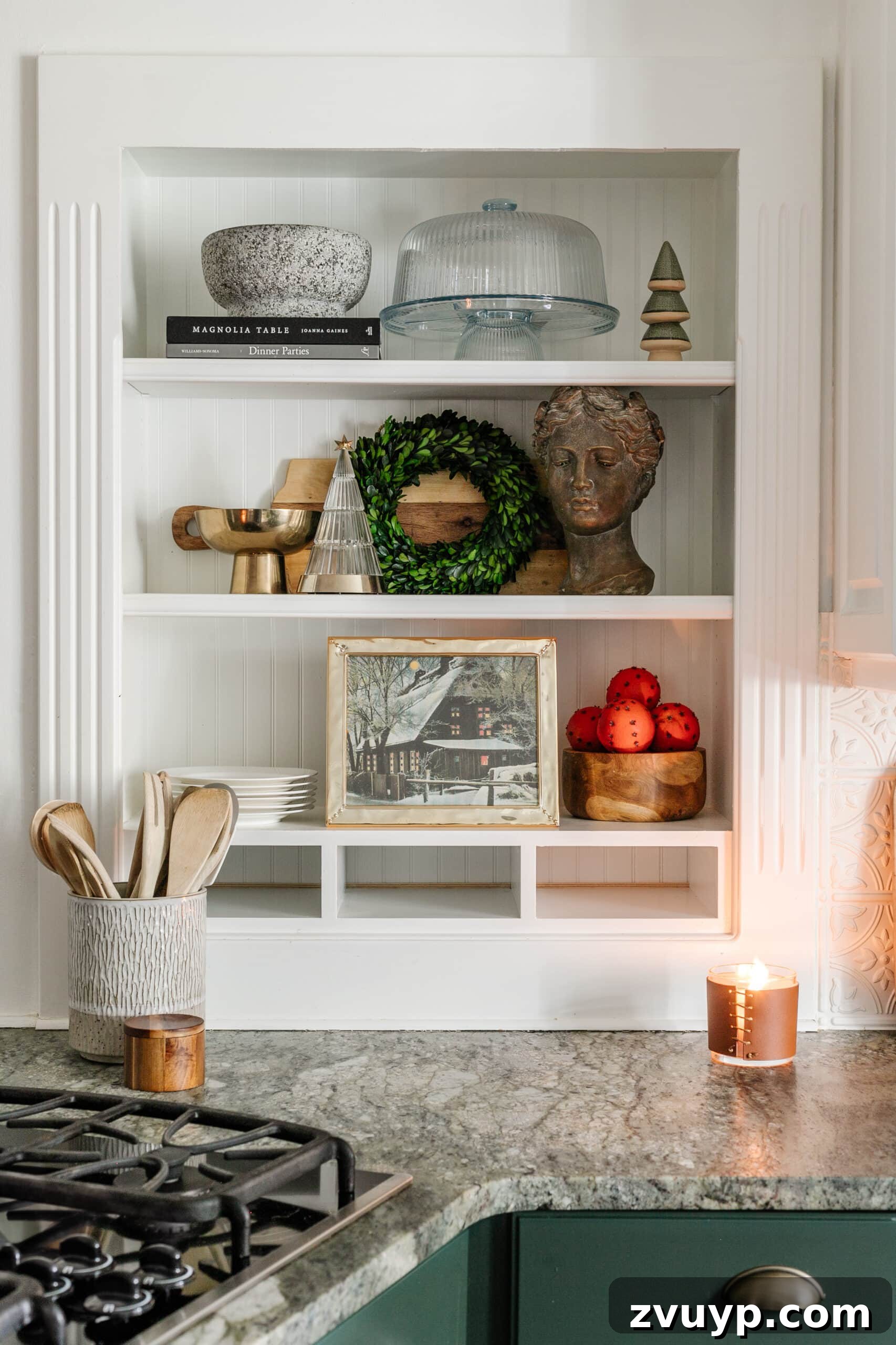 9 Quick Christmas Kitchen Transformations 11 kitchen Christmas decor on shelves with mini wreath, winter art, and mini Christmas tree figurines