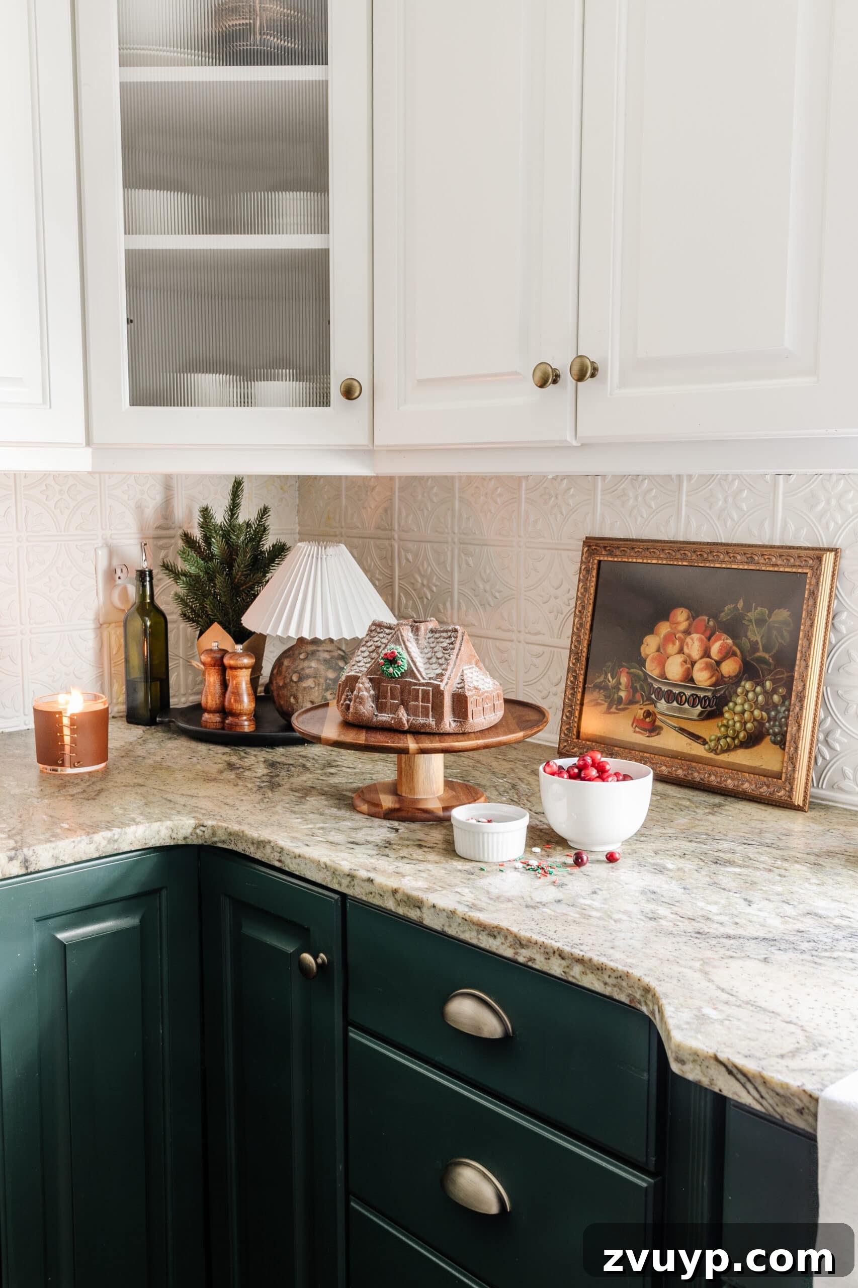 9 Quick Christmas Kitchen Transformations 9 fake gingerbread house cake and mini lamp on kitchen countertop for Christmas