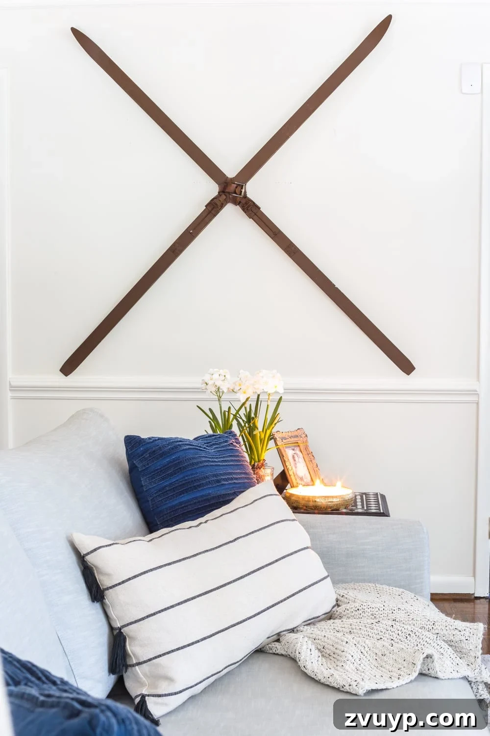 Winter Warm-Up: Easy Decor for a Cozy Retreat 7 Vintage winter skis displayed as unique wall decor, adding a rustic charm to the space