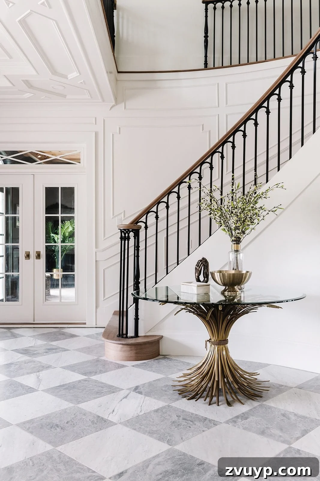 Elevate Your Foyer: 9 Dramatic Black Stair Railing Designs 6 entryway staircase with wood handrail and black scalloped balusters