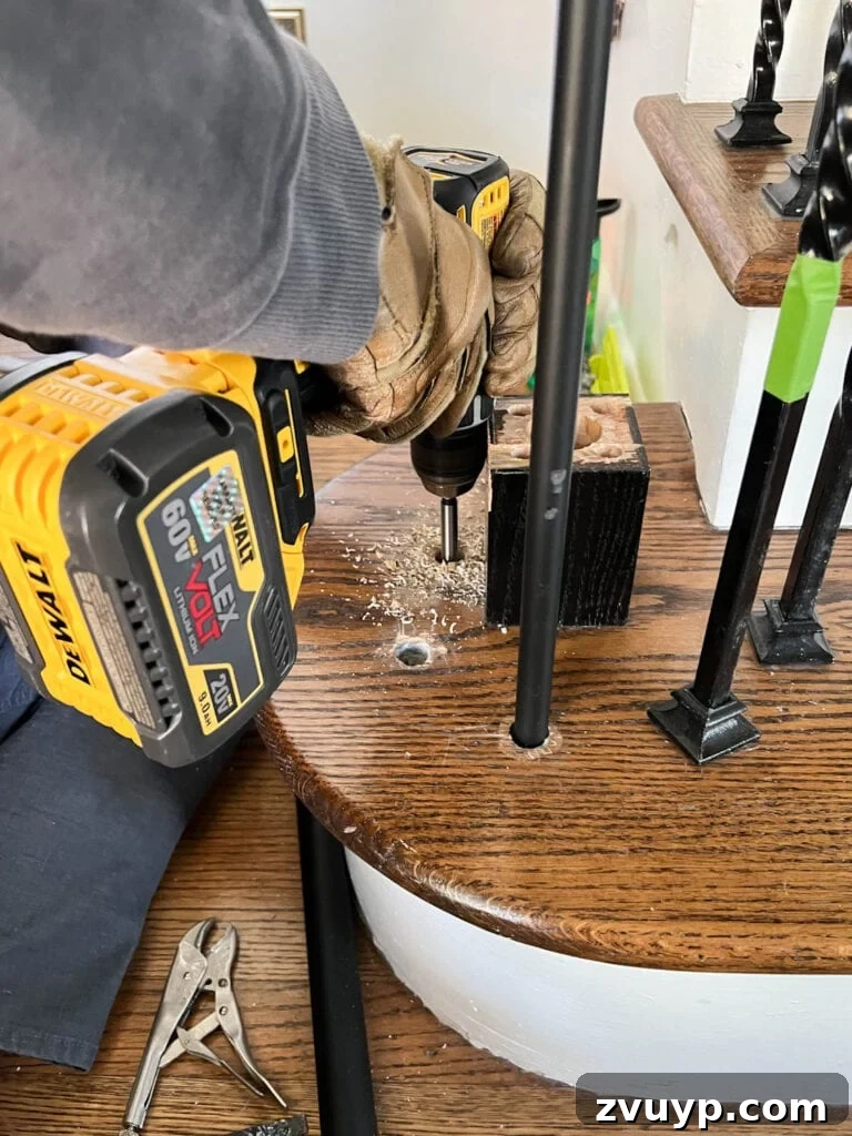 DIY Stair Spindle Swap For A Modern Makeover 12 Drilling new baluster holes on stair treads using a forstner bit for precision