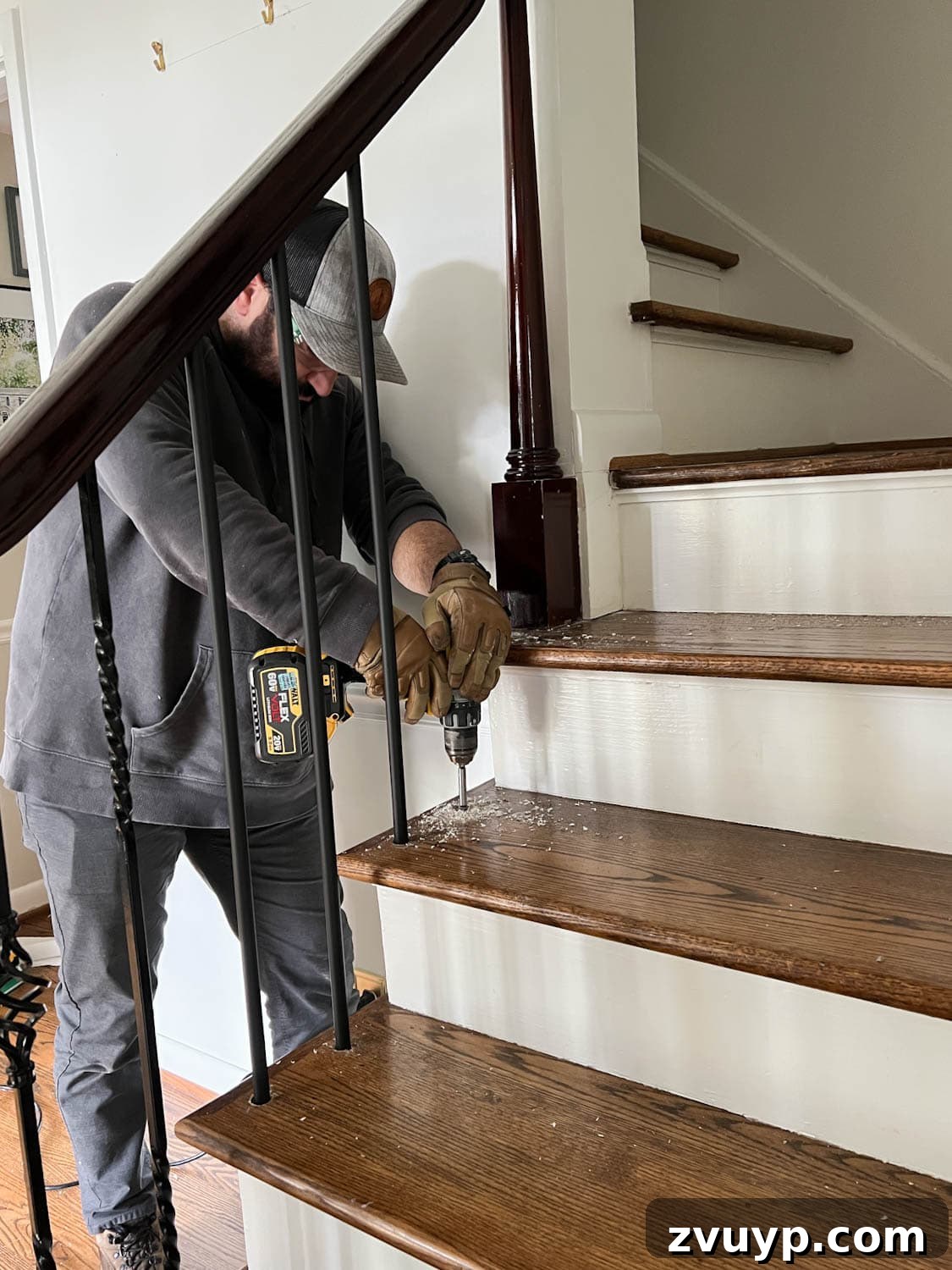 DIY Stair Spindle Swap For A Modern Makeover 15 Drilling larger stair baluster holes in stair treads for a better fit