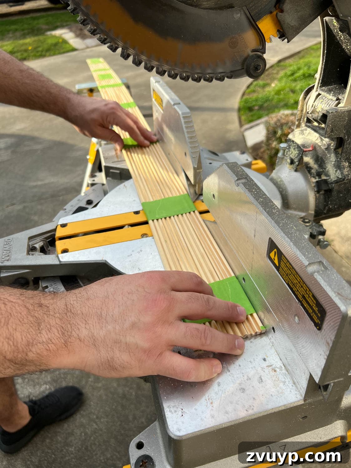 From Bland to Grand The Reeded Shoe Bench Makeover 12 Bundled decorative fluting strips secured with painter's tape, ready to be cut precisely on a miter saw for furniture application.