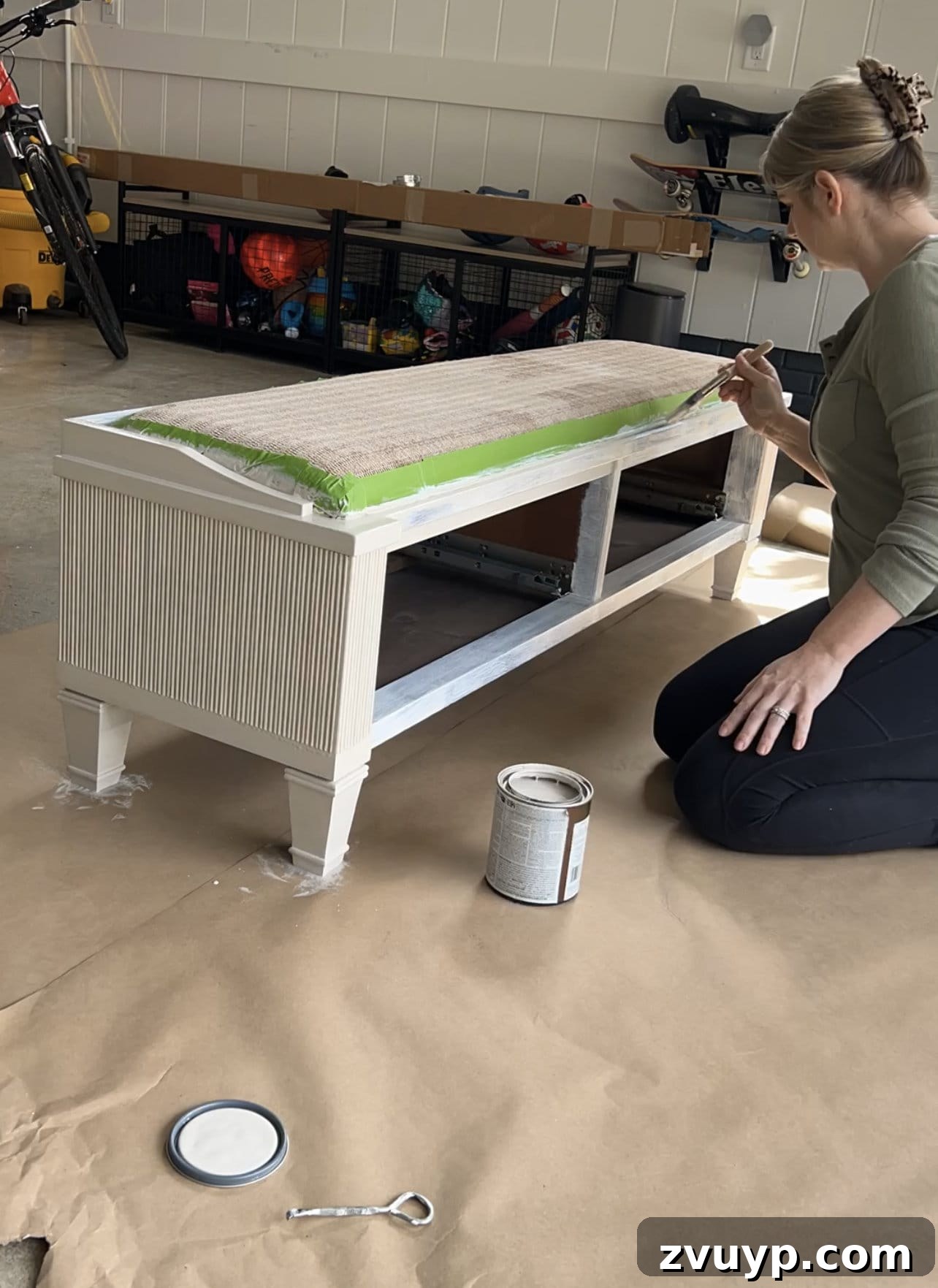 From Bland to Grand The Reeded Shoe Bench Makeover 16 Painting the reeded bench in Sherwin Williams Anew Gray, highlighting the detailed work and the emerging new color.