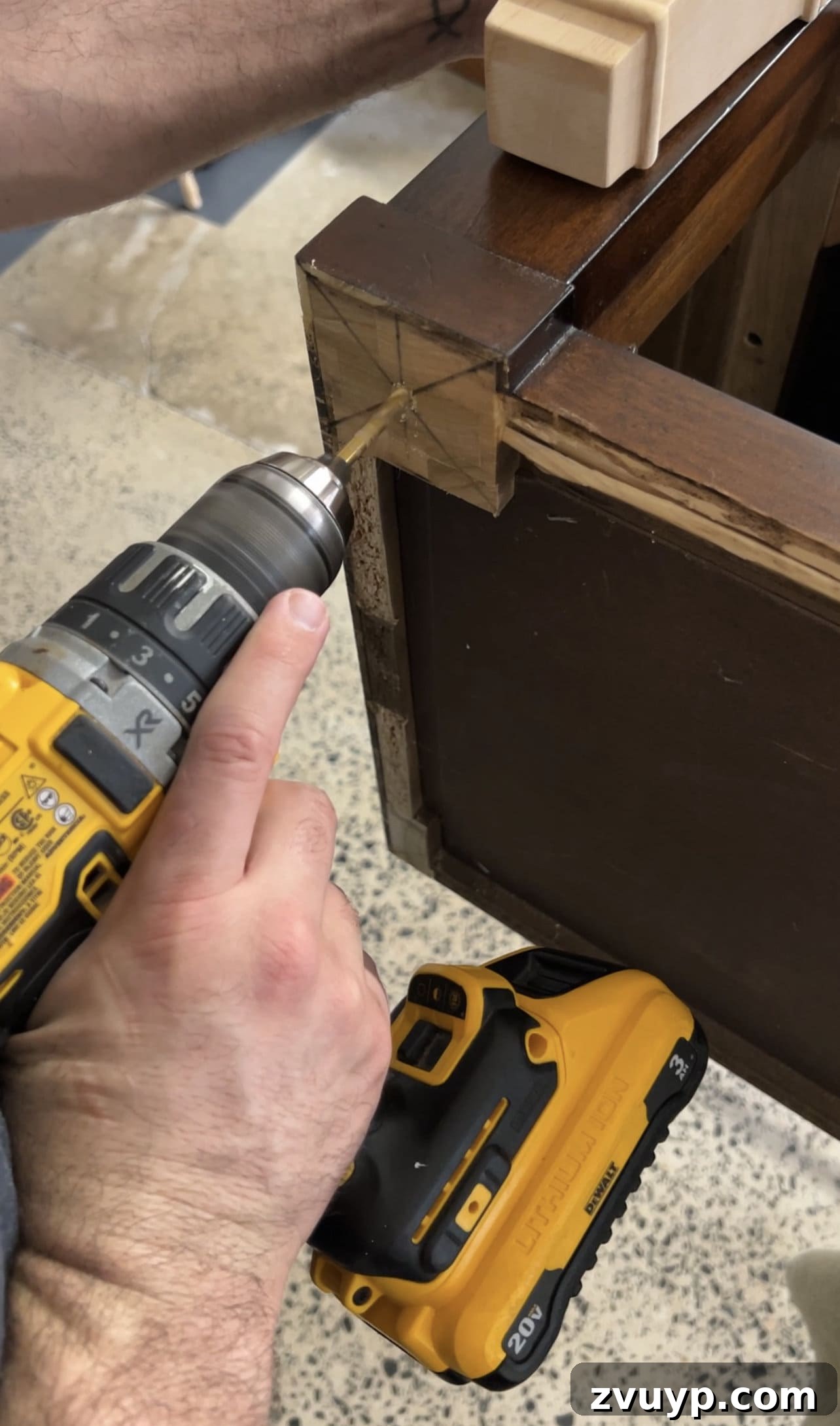 From Bland to Grand The Reeded Shoe Bench Makeover 10 Drilling pilot holes into the bench base, preparing for the secure attachment of new furniture legs.