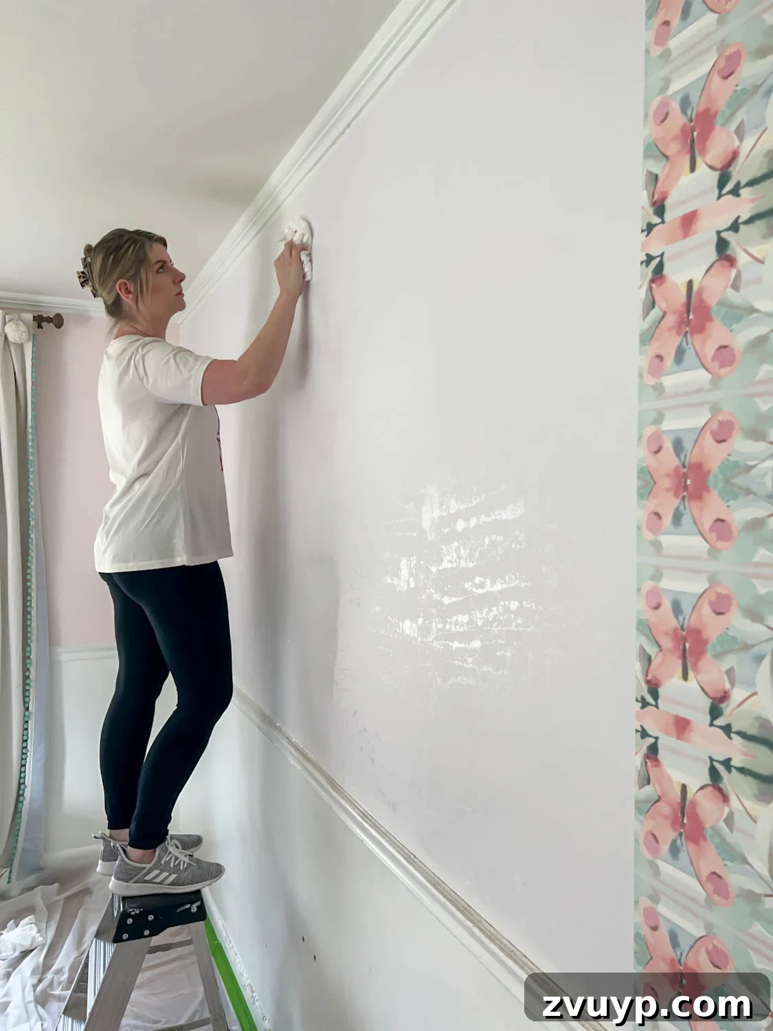 Mastering Wallpaper Removal: 3 Tried and True Methods 17 Cleaning adhesive off of wall after wallpaper stripping for a smooth surface