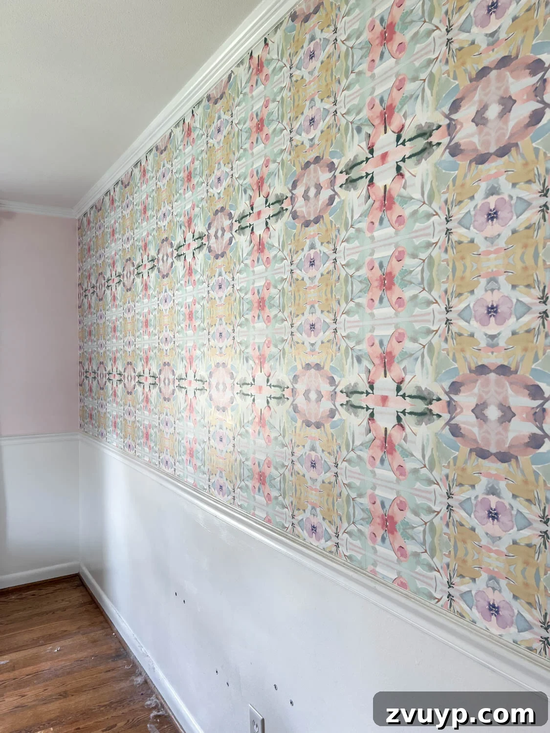 Mastering Wallpaper Removal: 3 Tried and True Methods 3 Pasted wallpaper on a wall in a bedroom, ready for removal