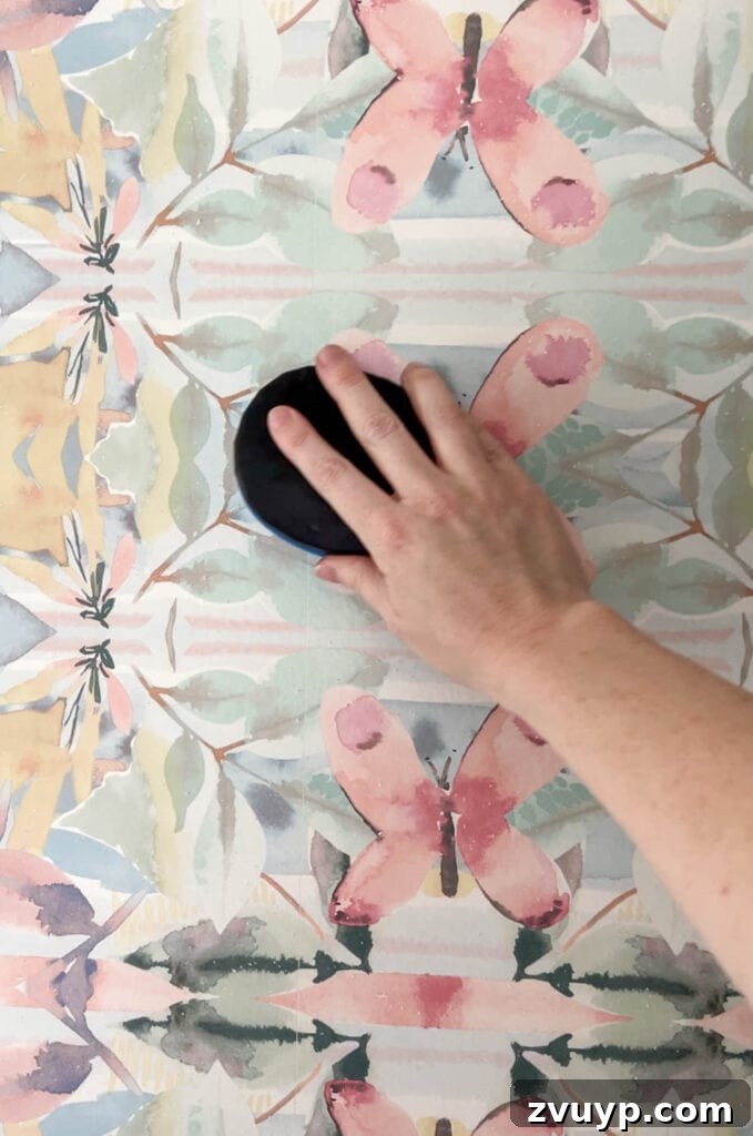Mastering Wallpaper Removal: 3 Tried and True Methods 7 Scoring wallpaper meticulously for effective removal
