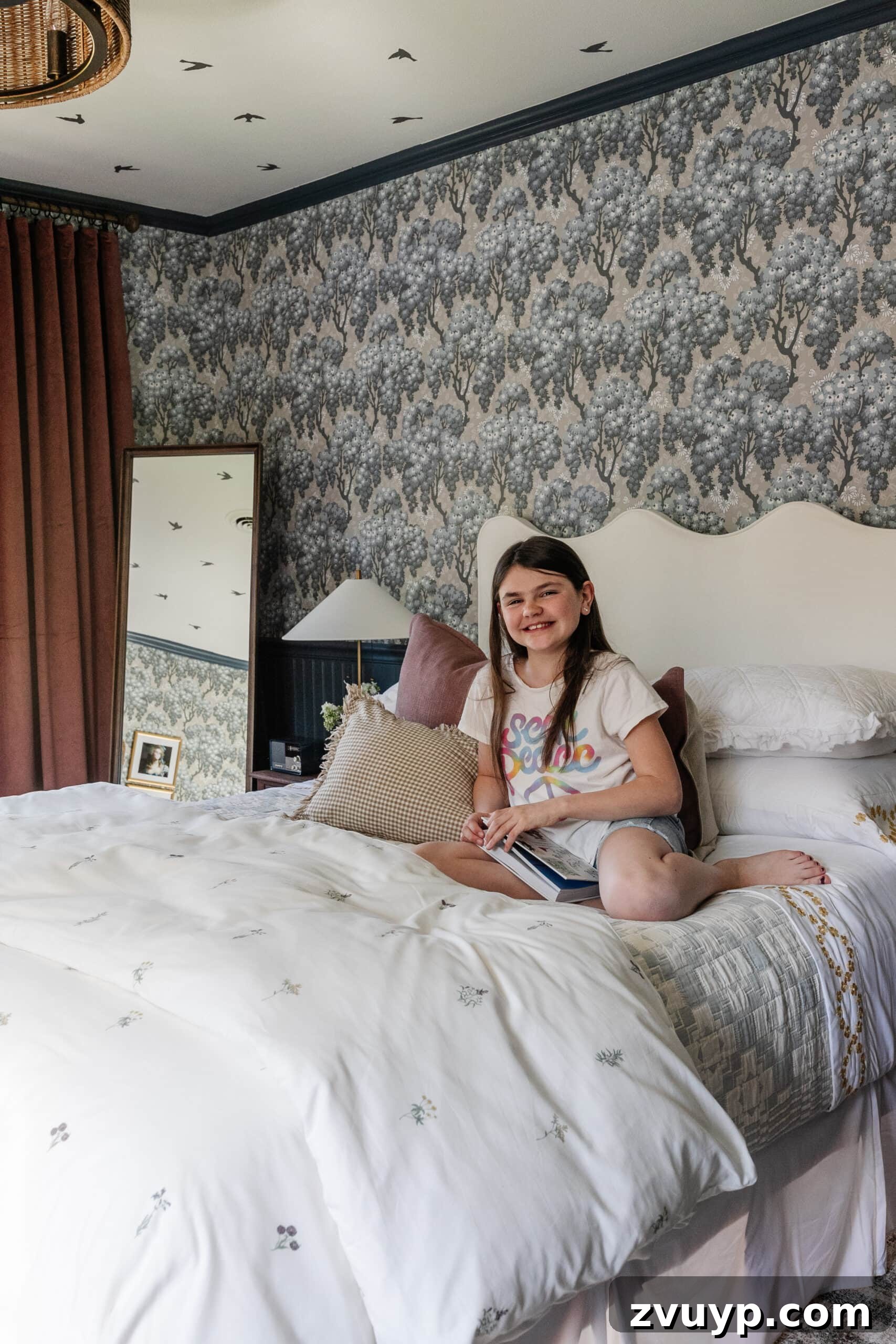 Dreamy Blue Bedrooms: Teen Girl Decorating Ideas and Room Tour 21 girl on bed in swedish cottage bedroom