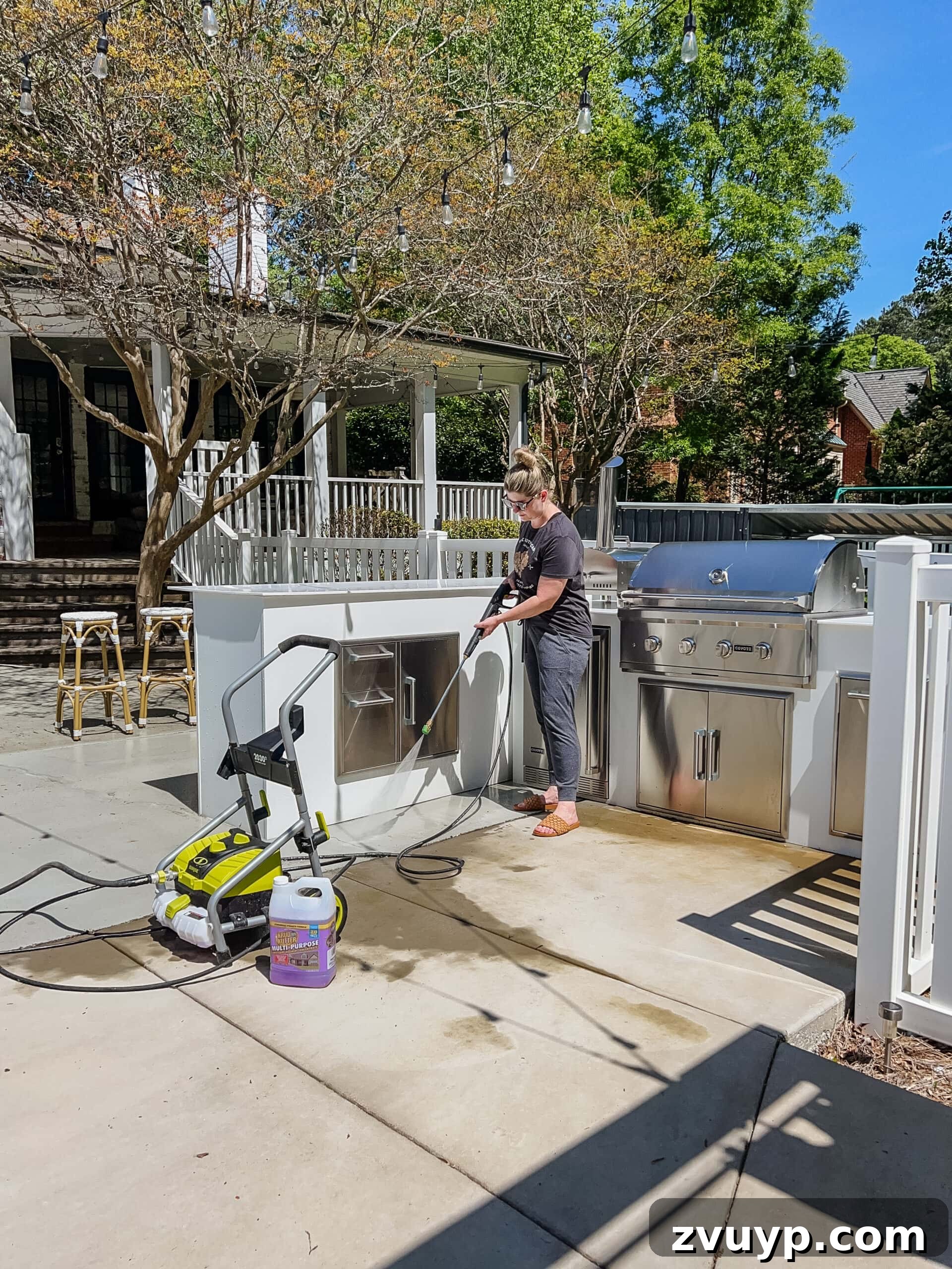 Effortless Spring Patio Refresh 11 cleaning backyard patio concrete with a pressure washer and krud kutter