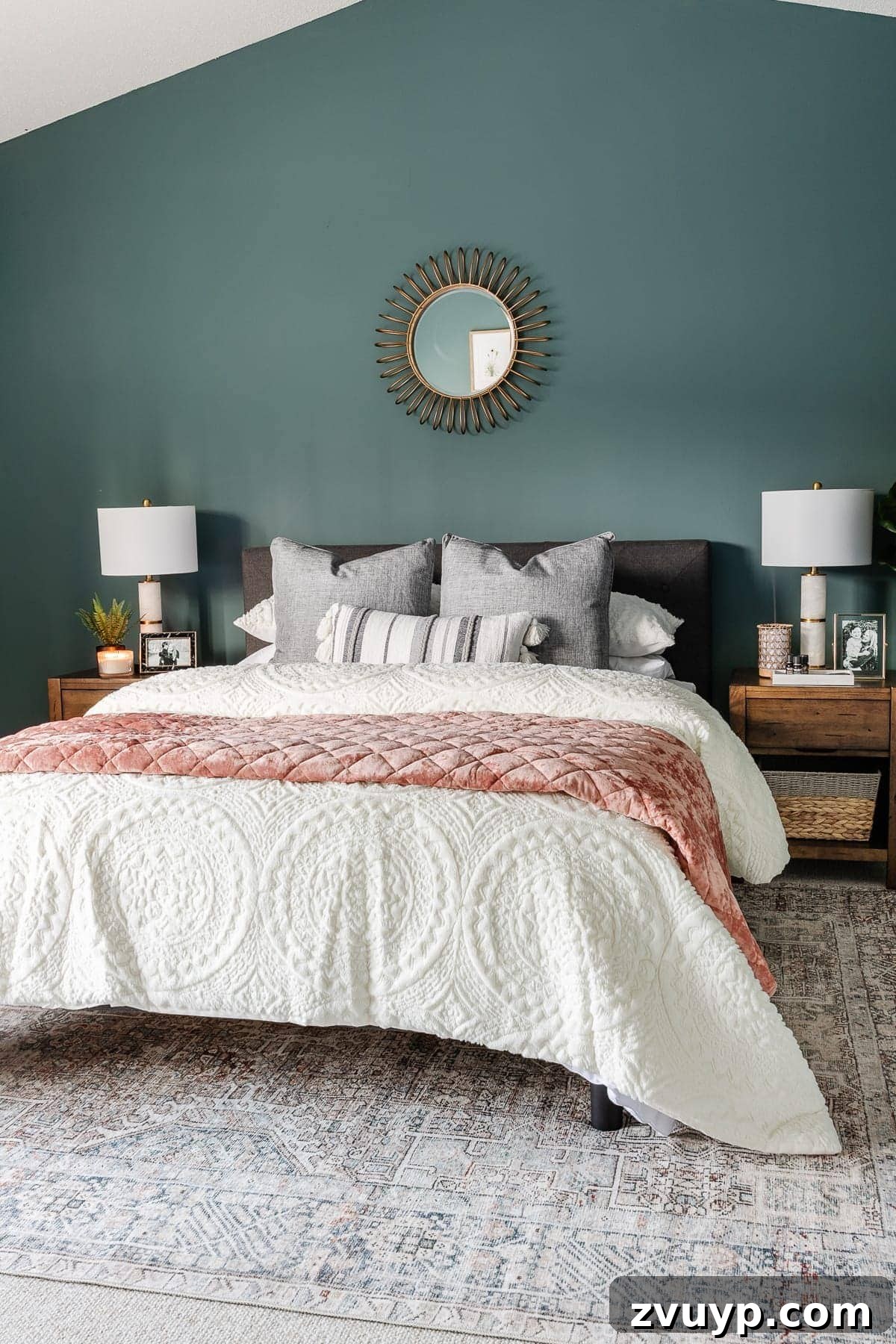 Timeless Traditional Rugs from Loloi 11 Bedroom with teal walls and a Chris Loves Julia x Loloi rug, creating a vibrant yet cozy atmosphere with its traditional pattern and rich colors.