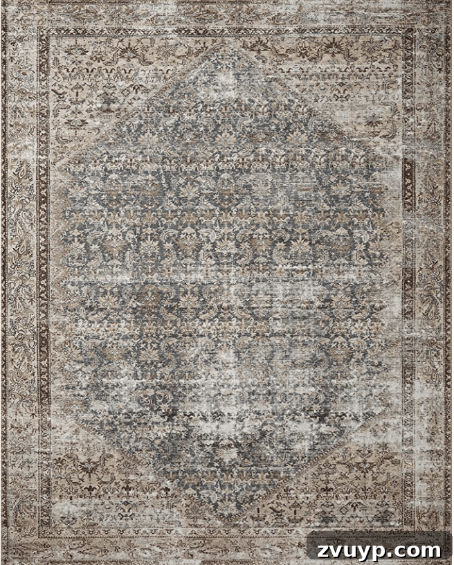 Timeless Traditional Rugs from Loloi 6 Close-up detail of the Amber Lewis x Loloi Georgie Teal/Antique rug, highlighting its rich blend of blue and red tones and vintage-inspired design.