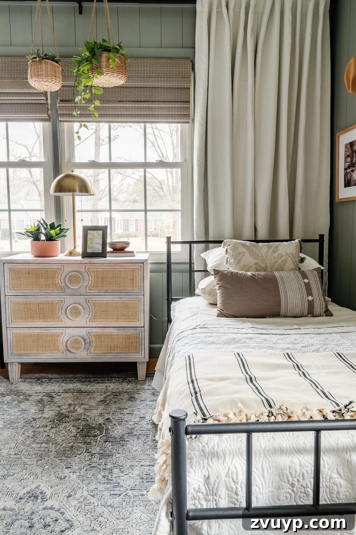Timeless Traditional Rugs from Loloi 9 Charming girls' shared bedroom with twin beds, soft sage green walls, and a beautiful Loloi rug providing a comfortable and stylish anchor to the space.