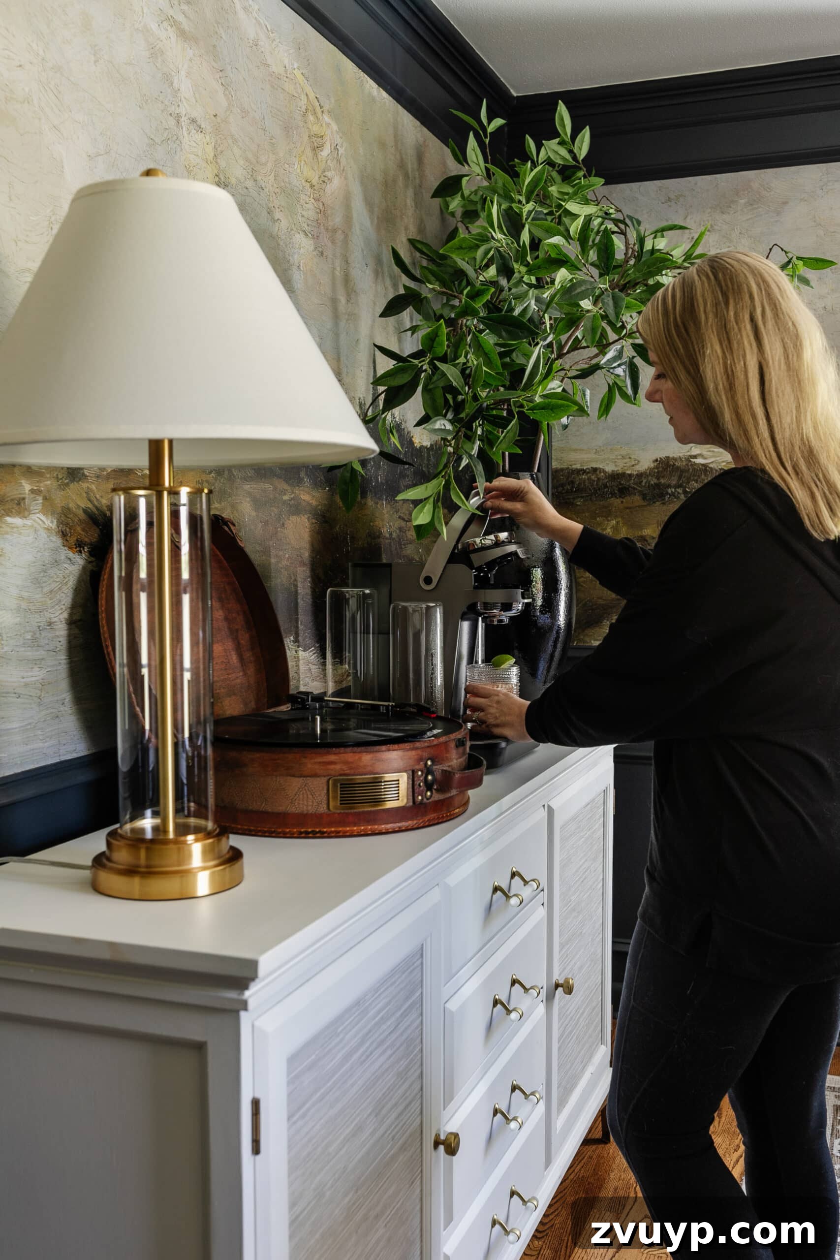 Bartesian Cocktail Maker Review: Is It Worth It? 2 using a Bartesian cocktail maker in a dining room for hosting