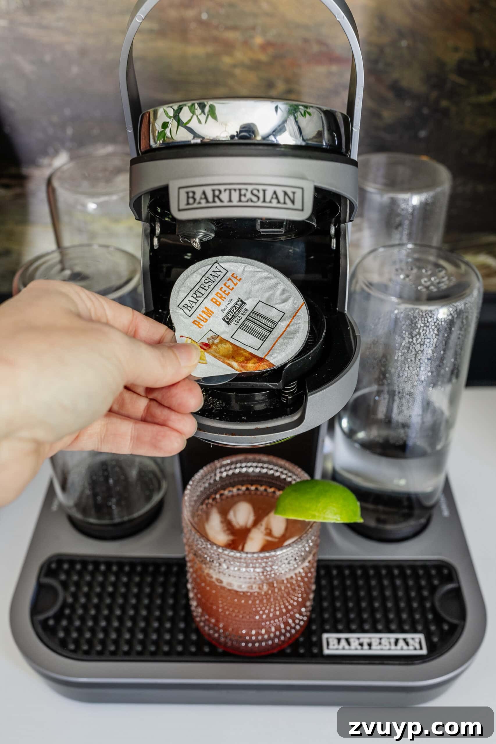 Bartesian Cocktail Maker Review: Is It Worth It? 5 adding a cocktail capsule to a bartesian machine
