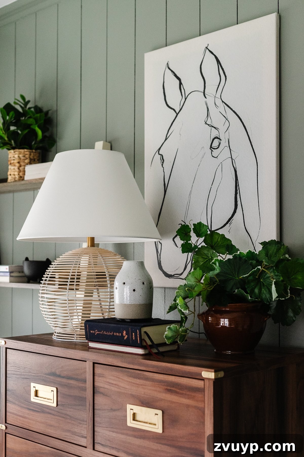 24 Clever Organization and Design Tips for Kids Spaces 19 rattan lamp, diffuser, and horse art on top of a dresser
