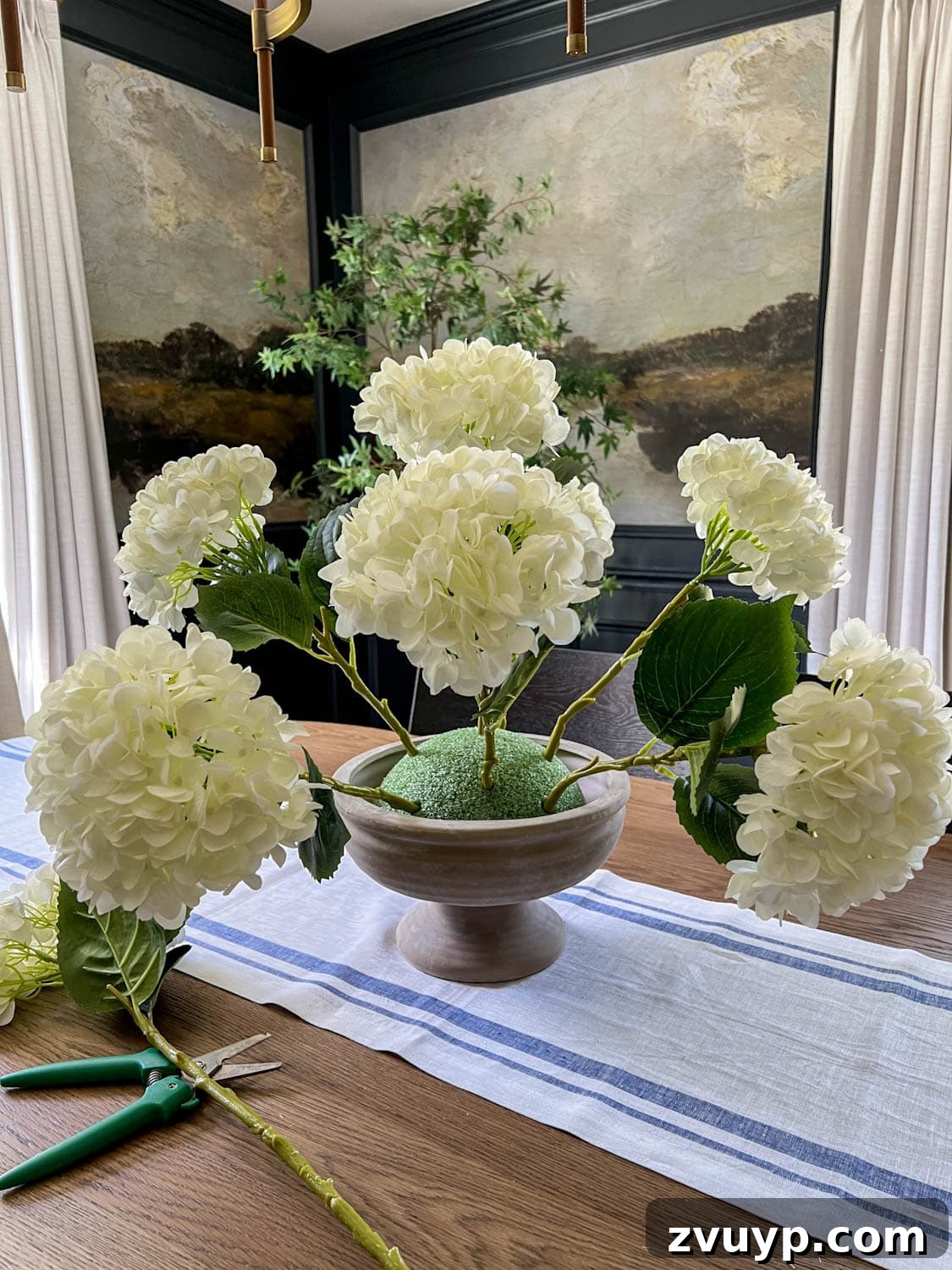 Effortless Charm DIY Faux Flower Creations 12 artificial flowers arranged in florist foam to make a DIY centerpiece