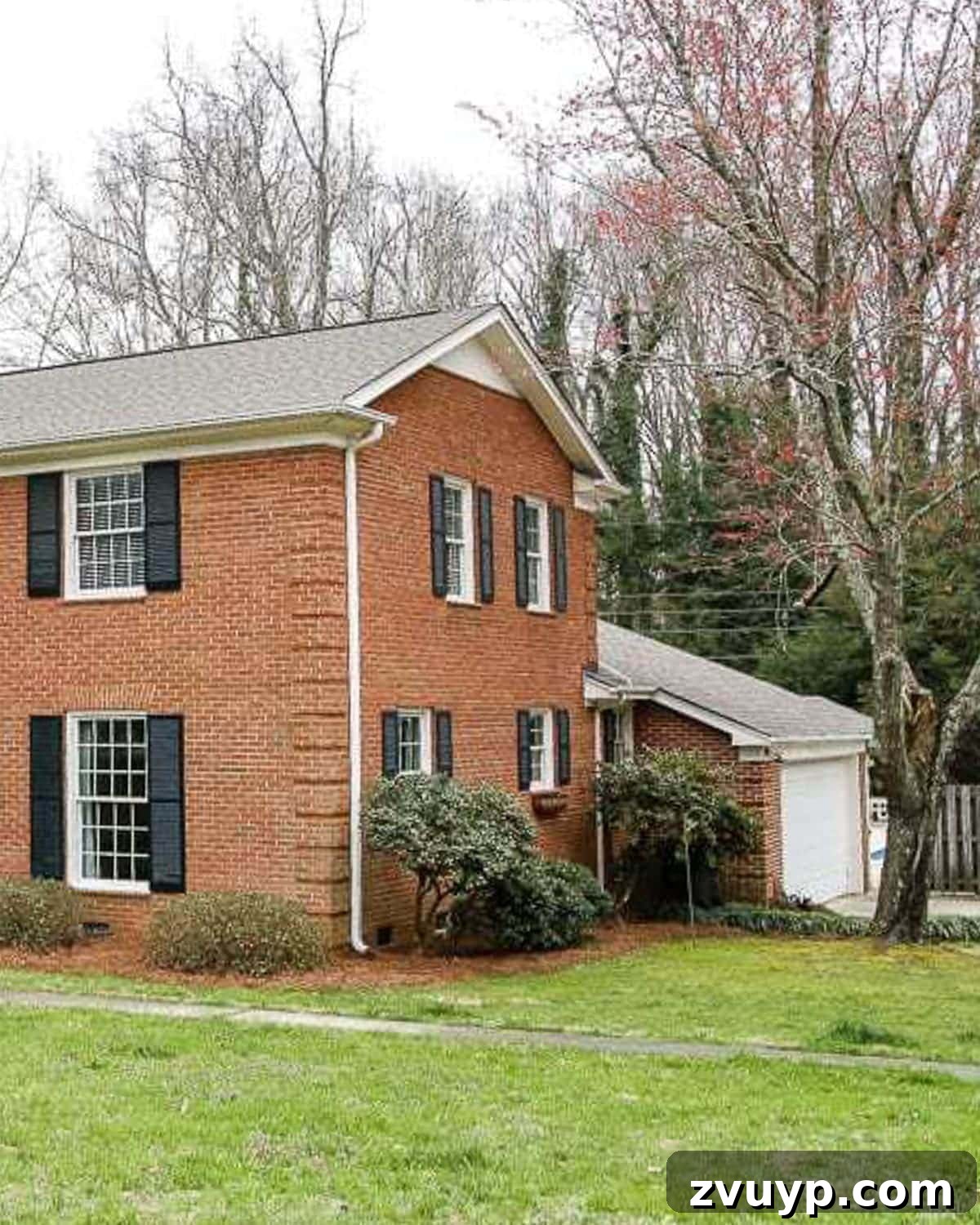 Pristine Limewashed Brick A Comprehensive Care Guide 19 Before: Natural brick colonial house with visible garage exterior