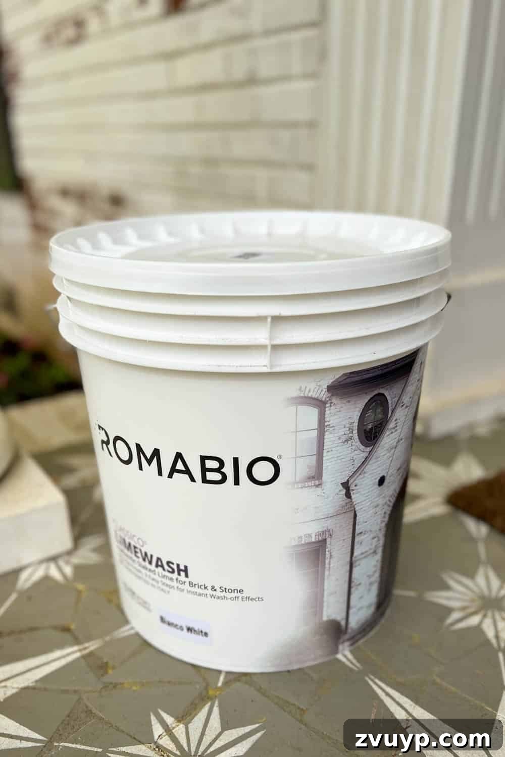 Pristine Limewashed Brick A Comprehensive Care Guide 7 4-gallon bucket of Romabio Classico Limewash in Bianco White, ready for application