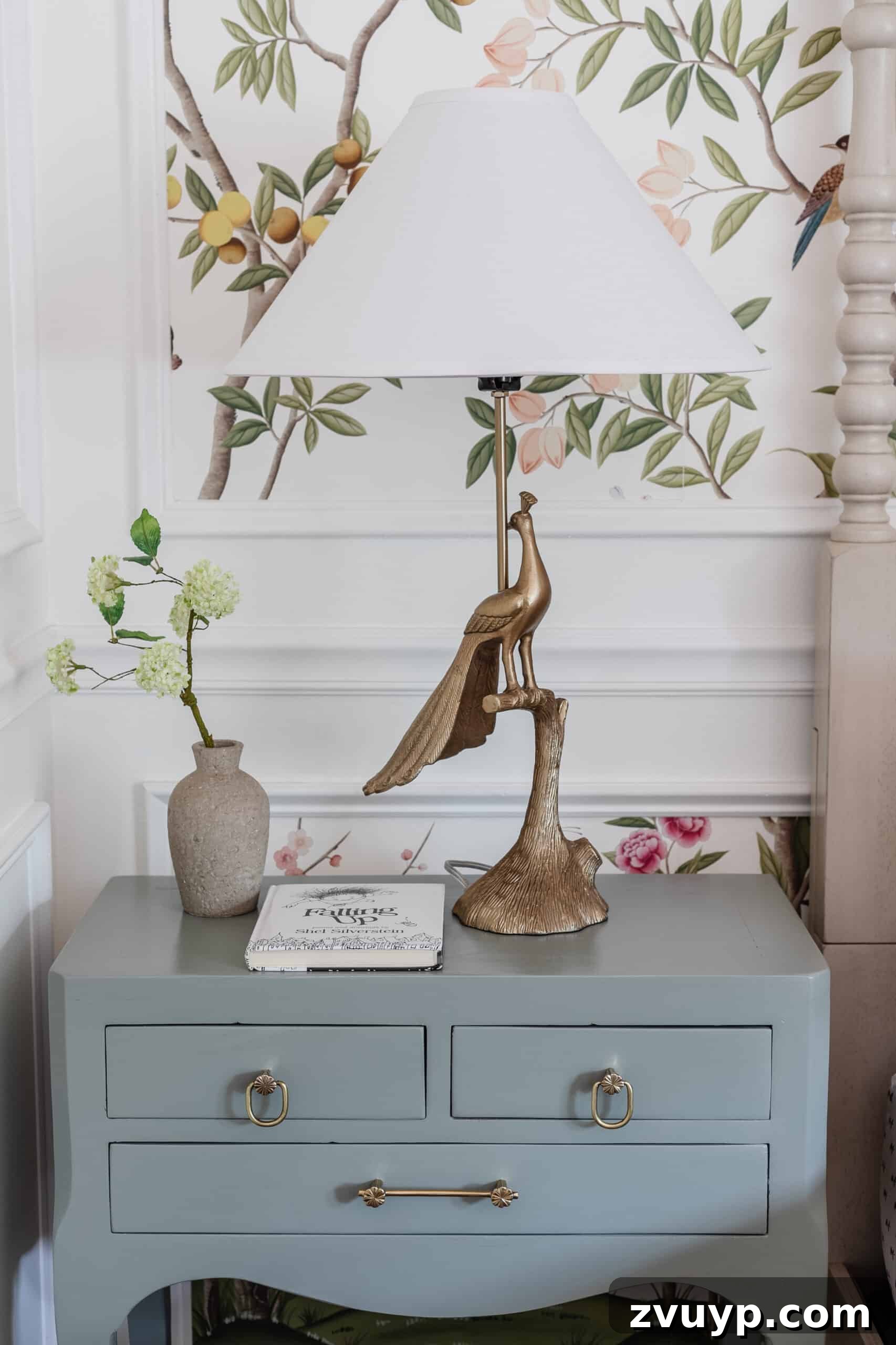 DIY Bedside Table Refresh: Secrets to Smooth Gloss Paint 13 peacock lamp on a mint green gloss painted nightstand, highlighting the reflective surface