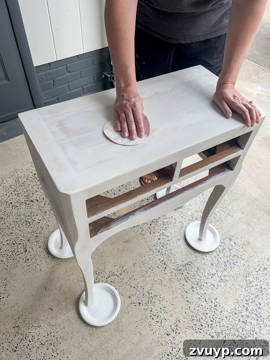 DIY Bedside Table Refresh: Secrets to Smooth Gloss Paint 7 sanding dried primer with ultra-fine sandpaper for a smooth finish before painting