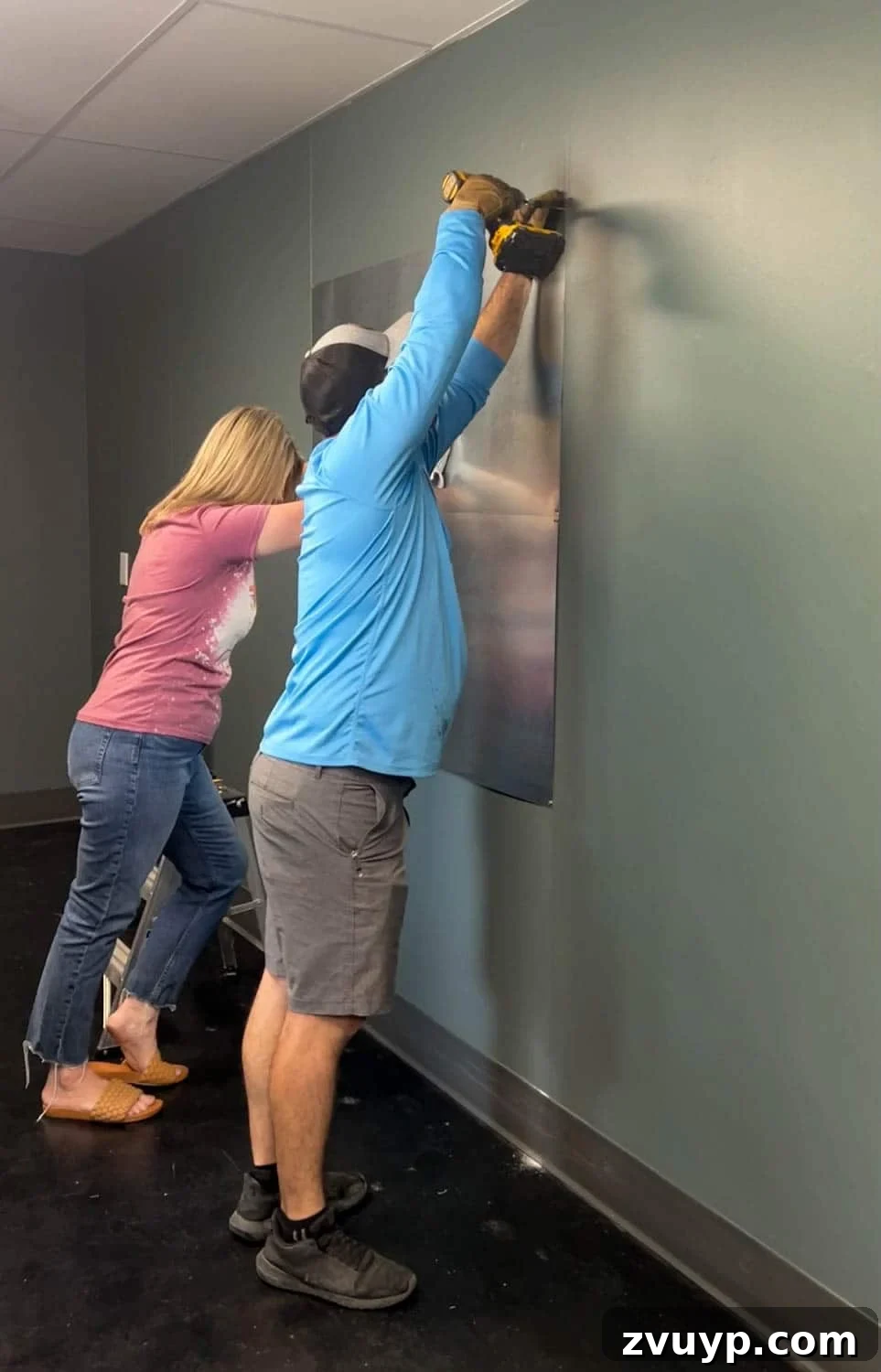 Craft Your Magnetic Wall Art Memo Board 9 attaching sheet metal to a wall to make a DIY memo board with construction adhesive
