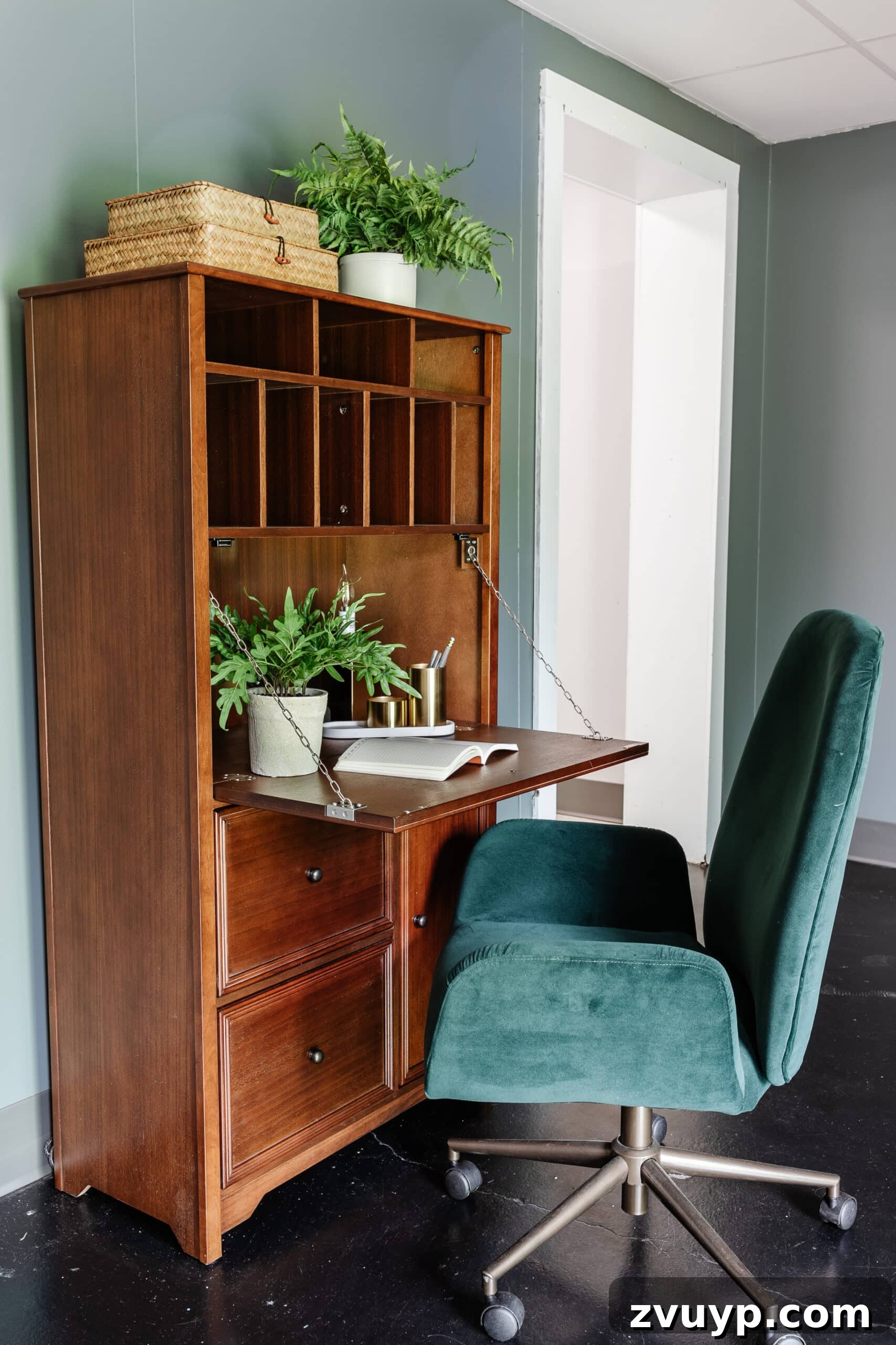 Transform Your Office: Cozy Conference Room Design Ideas 24 wooden secretary desk and green desk chair in an office