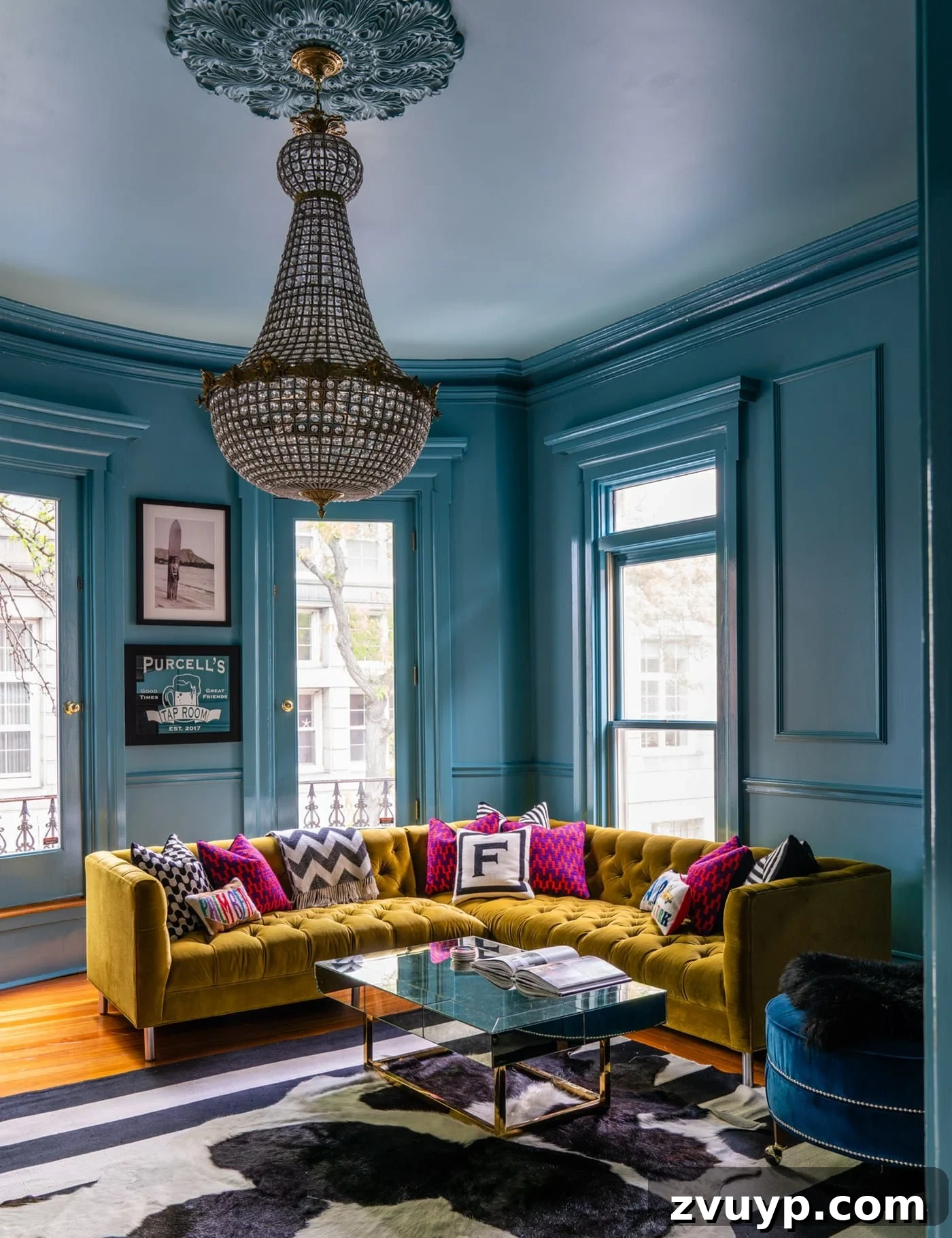 High gloss Farrow and Ball Stone Blue living room showcasing vibrant blue-green