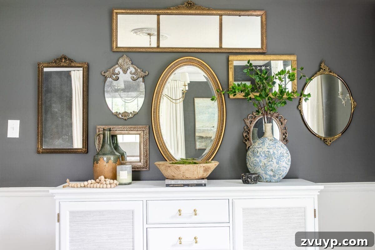 Hang Like a Pro: Avoid These Picture Frame Mistakes 11 Decorated buffet with a collection of art and decor, showcasing thoughtful arrangement.