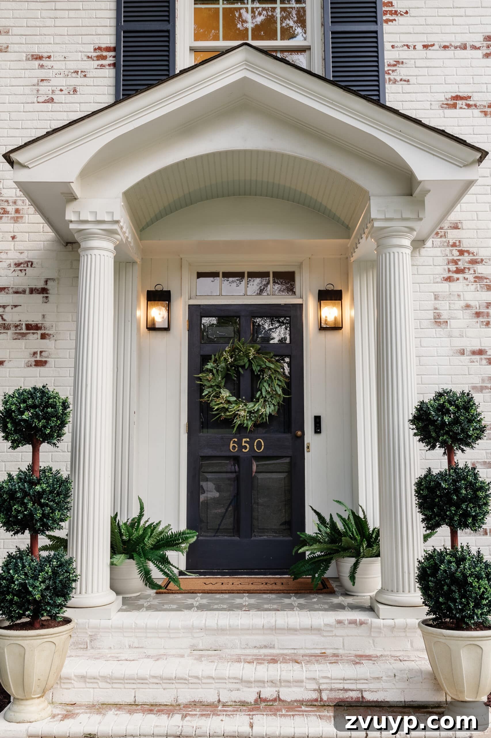 Lifelike Faux Plants for Effortless Porch Planters 2 colonial house front porch stoop with faux outdoor plants in planters
