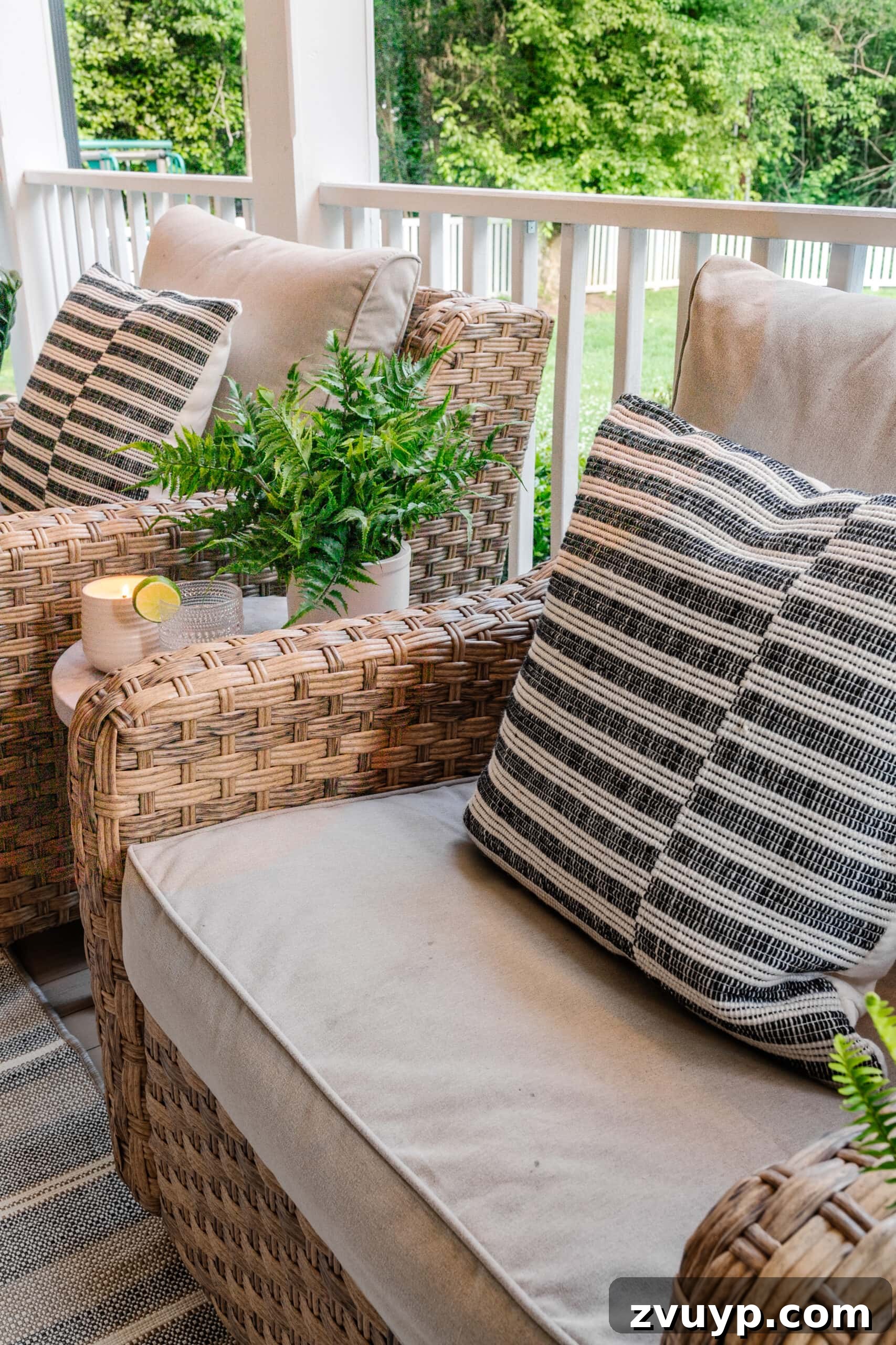 Lifelike Faux Plants for Effortless Porch Planters 12 back porch wicker chairs with faux fern on table