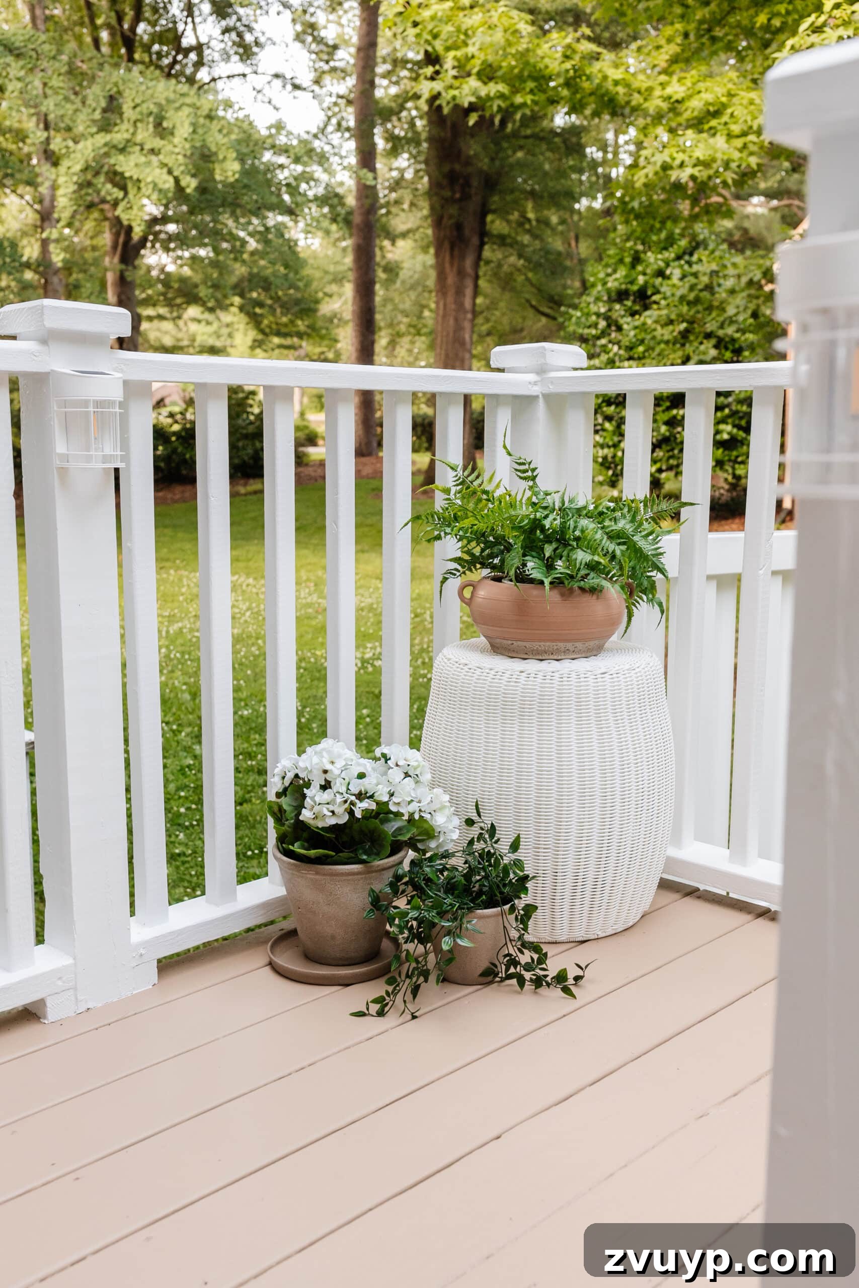 6 Small Side Porch Makeovers Before and After Inspiration 11 woven outdoor end table with planters on a deck