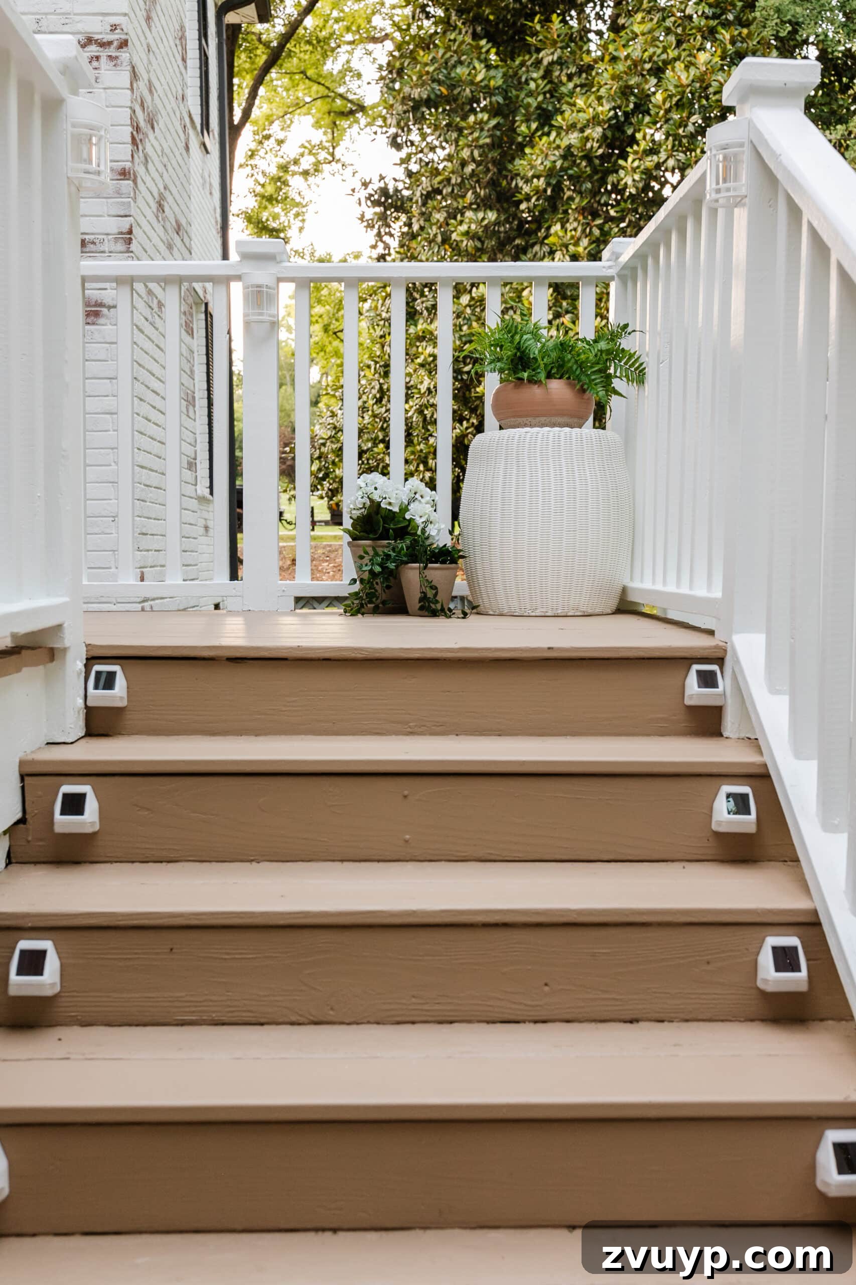6 Small Side Porch Makeovers Before and After Inspiration 9 deck step solar lights on a deck with planters