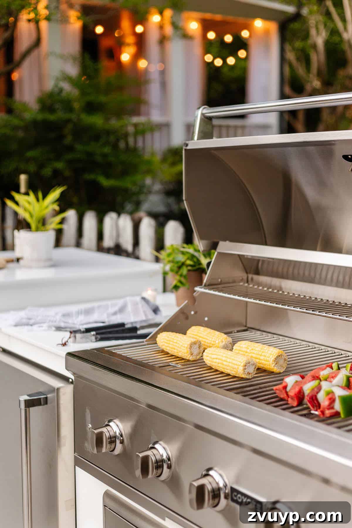 Dive Into Fun: Your Essential Guide to Epic Swim Parties and Backyard Bashes 17 backyard grill with corn on the cob and shish kabobs for a pool party