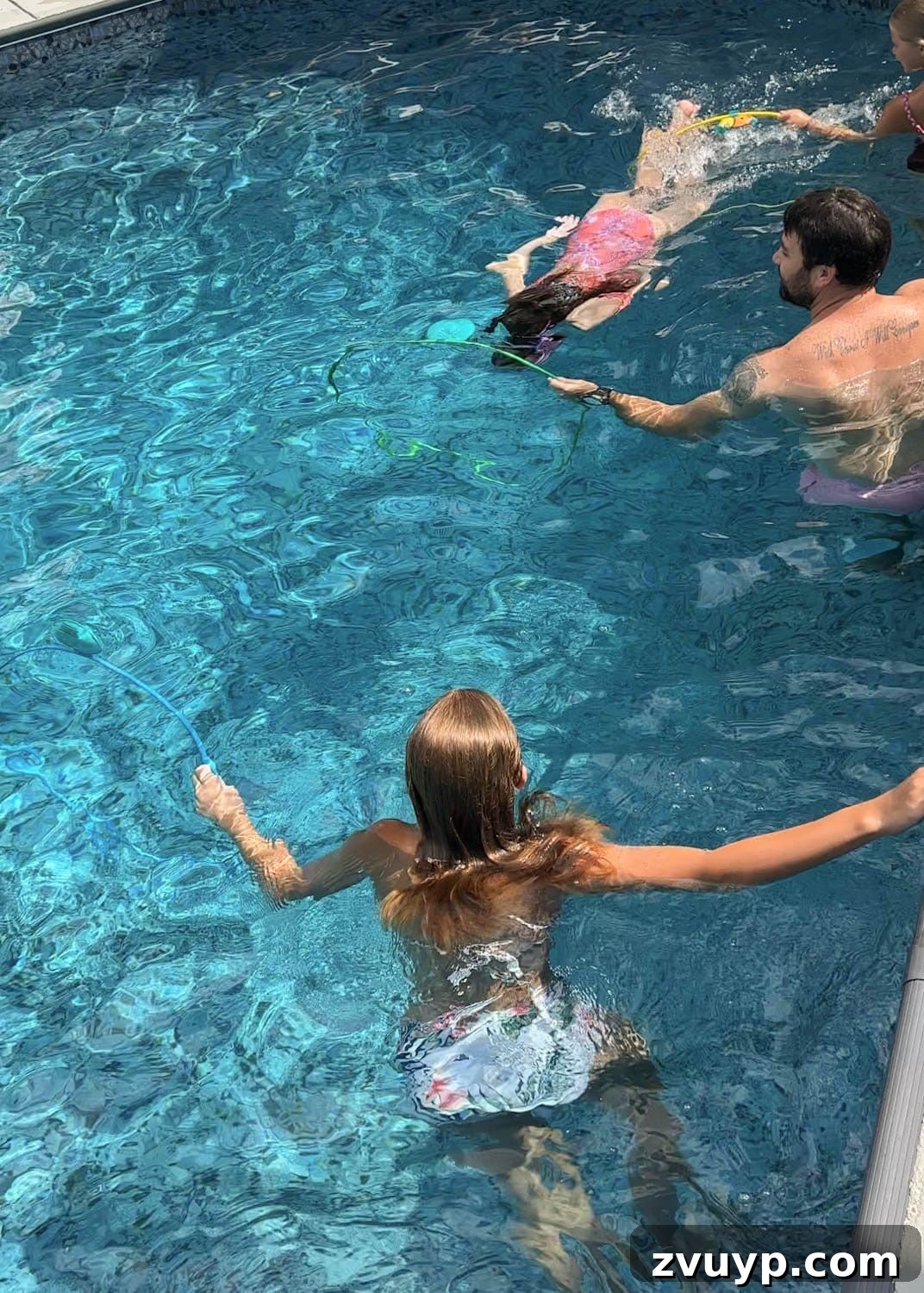 Dive Into Fun: Your Essential Guide to Epic Swim Parties and Backyard Bashes 10 swim-through rings for pool party game idea