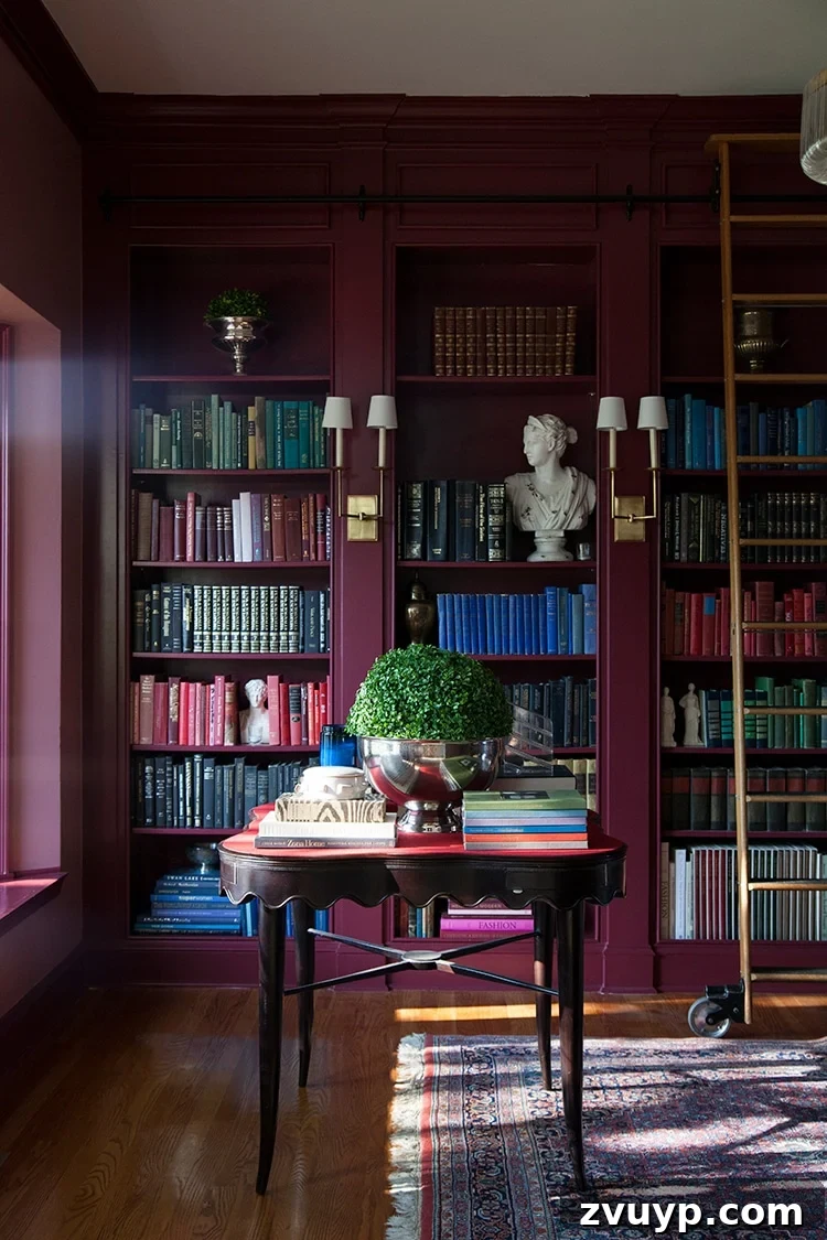 12 Must-Have Burgundy Paint Hues Endorsed by Design Experts 16 the makerista burgundy built in shelves library room sherwin williams radicchio leaf
