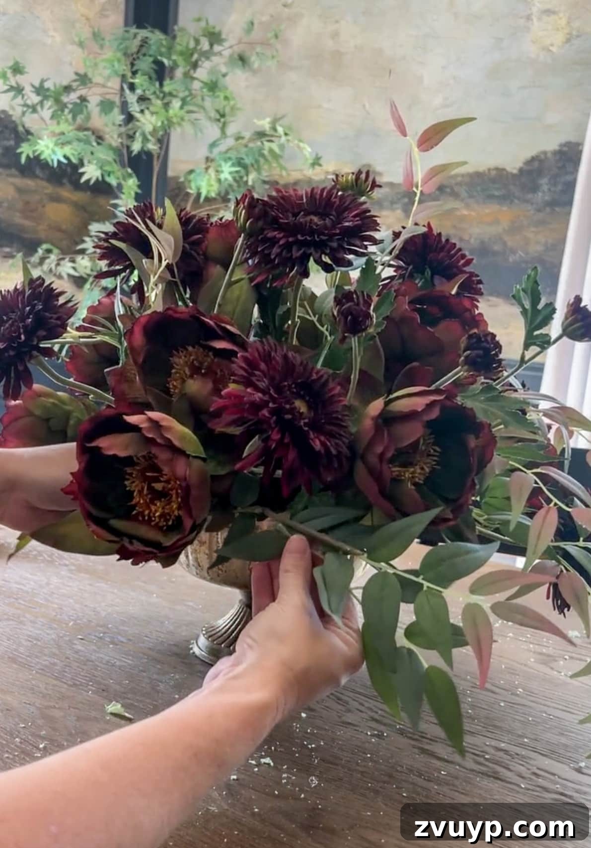 Autumn Blooms: Simple DIY Floral Arrangements 13 Adding leafy stems around the base of a flower arrangement to conceal foam and create softness